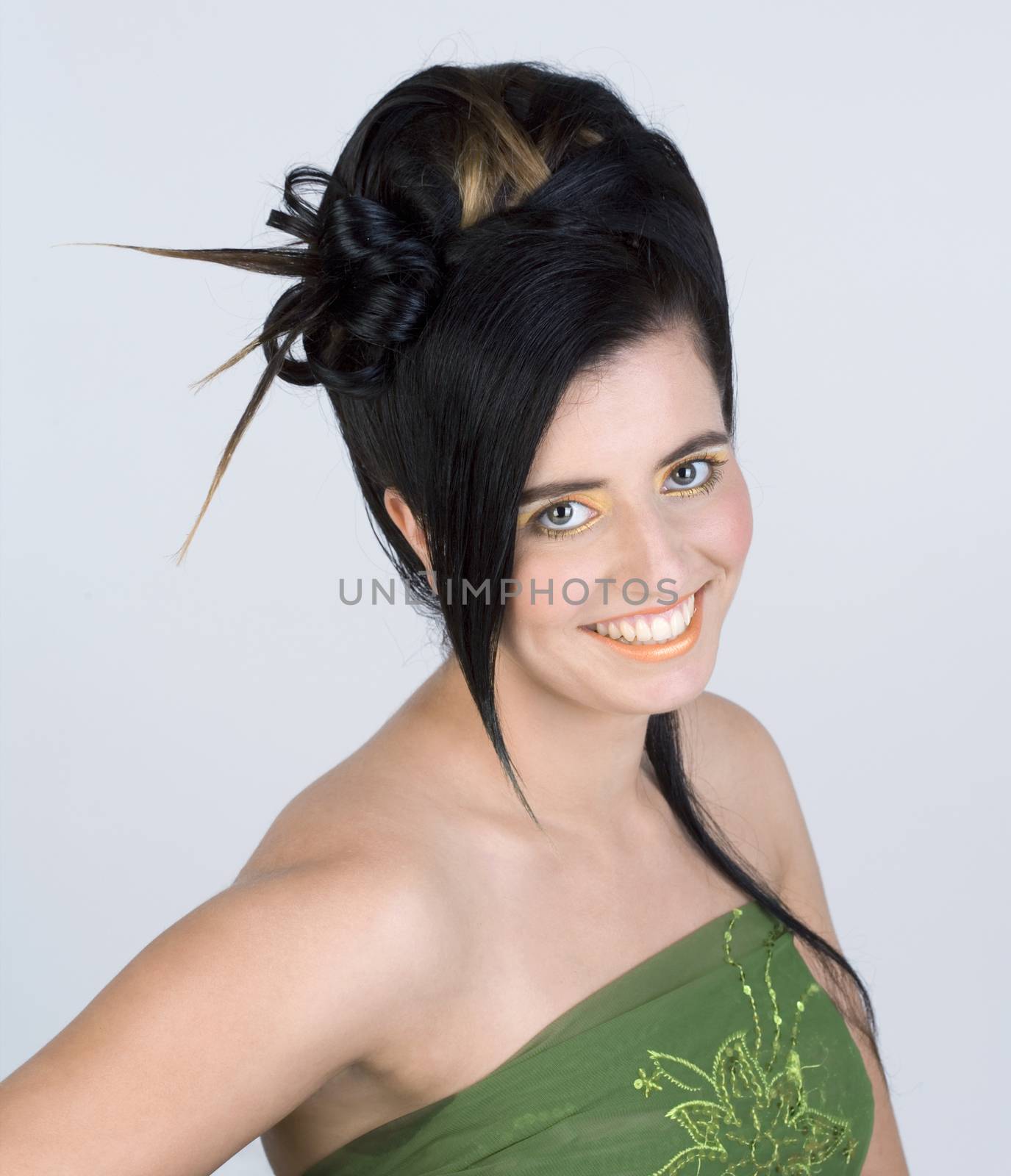 Portrait of a Young Woman with Colorful Makeup and Fancy Hairstyle