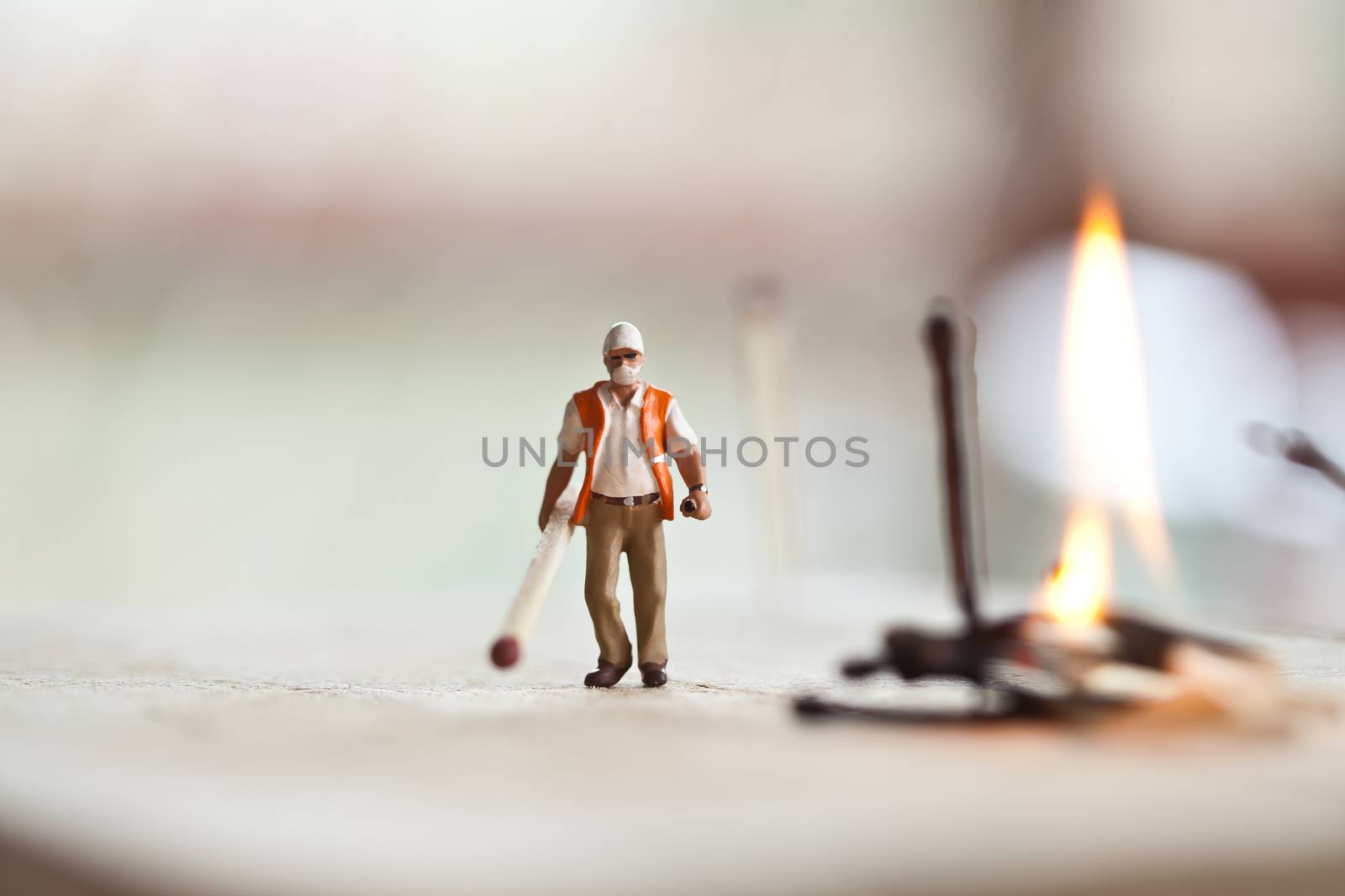 Miniature people in action in various situations