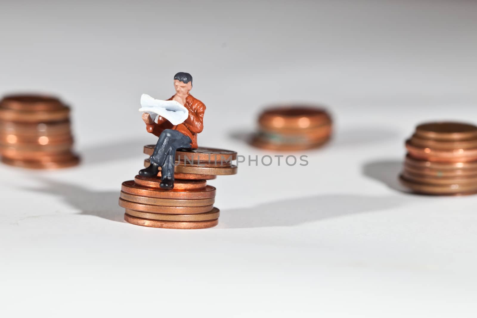 Miniature people in action in various situations