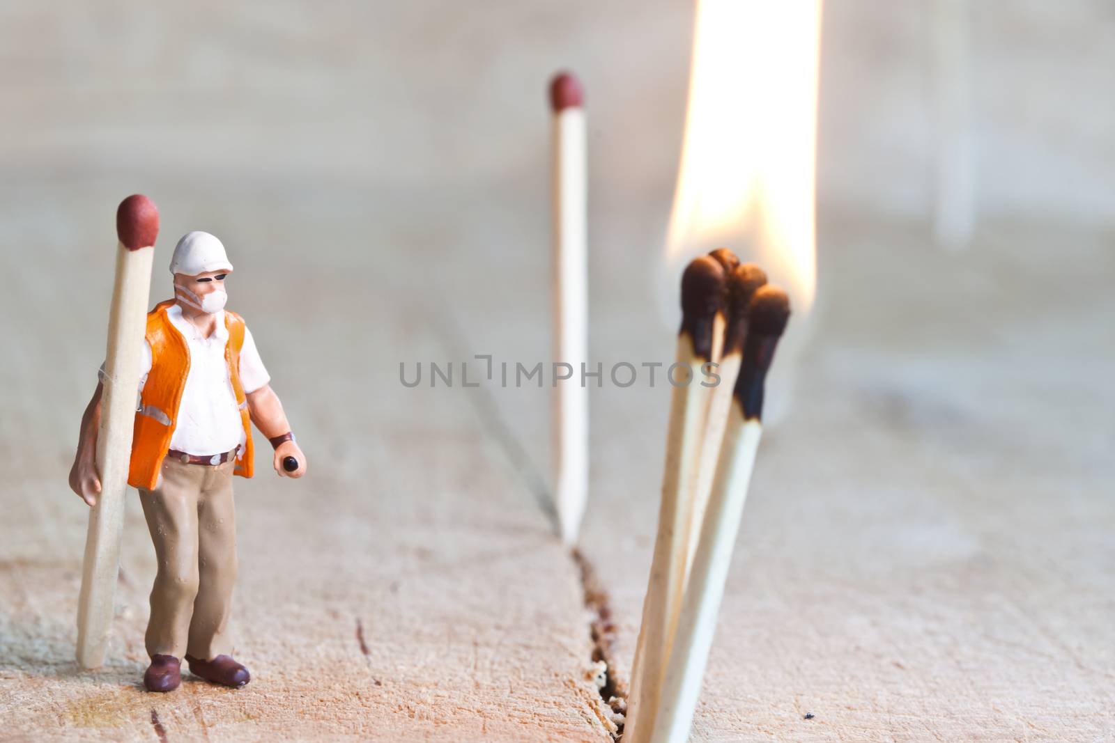 Miniature people in action in various situations