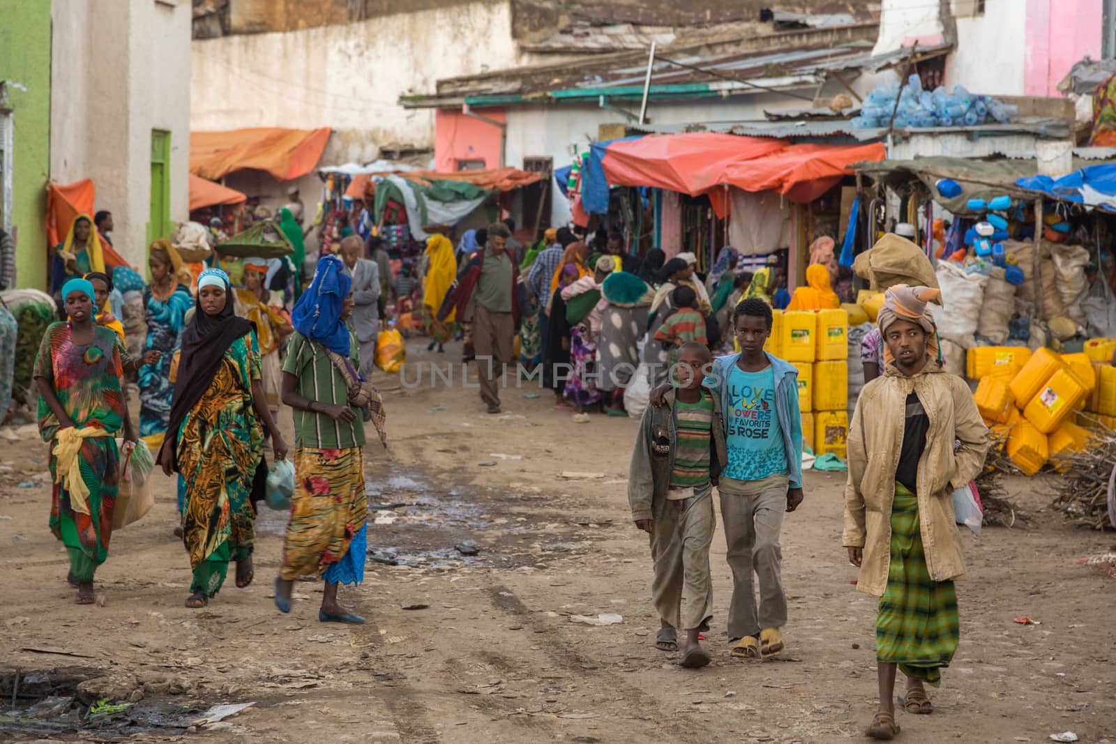 HARAR, ETHIOPIA - JULY 26,2014 - Local residents of Jugol, the fortified historic walled city within Harar, which was included in the World Heritage List for its cultural heritage by UNESCO and considered as the fourth holy city of Islam.