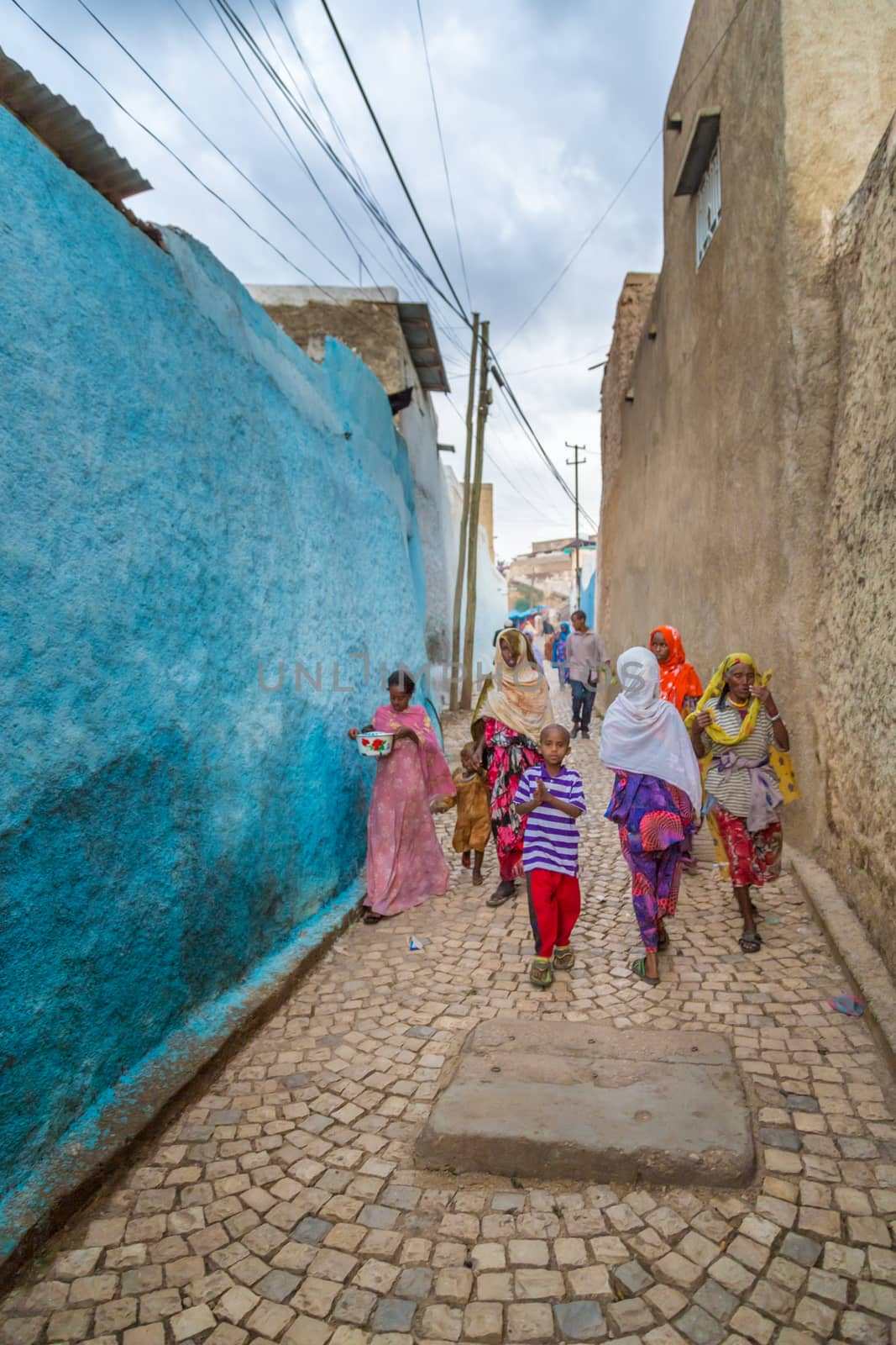 HARAR, ETHIOPIA - JULY 26,2014 - Local residents of Jugol, the fortified historic walled city within Harar, which was included in the World Heritage List for its cultural heritage by UNESCO and considered as the fourth holy city of Islam.