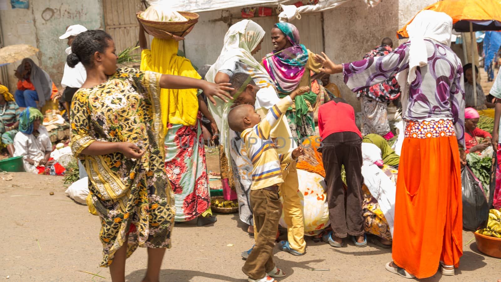 HARAR, ETHIOPIA - JULY 26,2014 - Local residents of Jugol, the fortified historic walled city within Harar, which was included in the World Heritage List for its cultural heritage by UNESCO and considered as the fourth holy city of Islam.