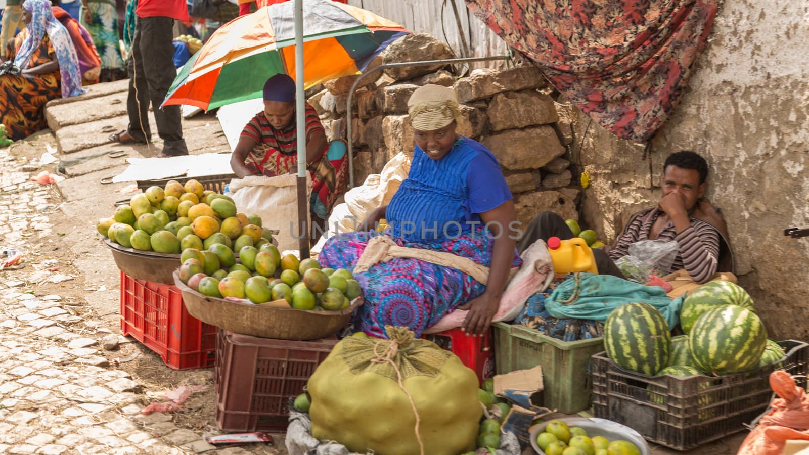 HARAR, ETHIOPIA - JULY 26,2014 - Local residents of Jugol, the fortified historic walled city within Harar, which was included in the World Heritage List for its cultural heritage by UNESCO and considered as the fourth holy city of Islam.