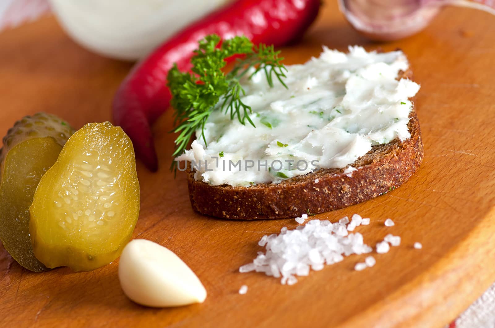 Lard spread on rye bread close up by dred