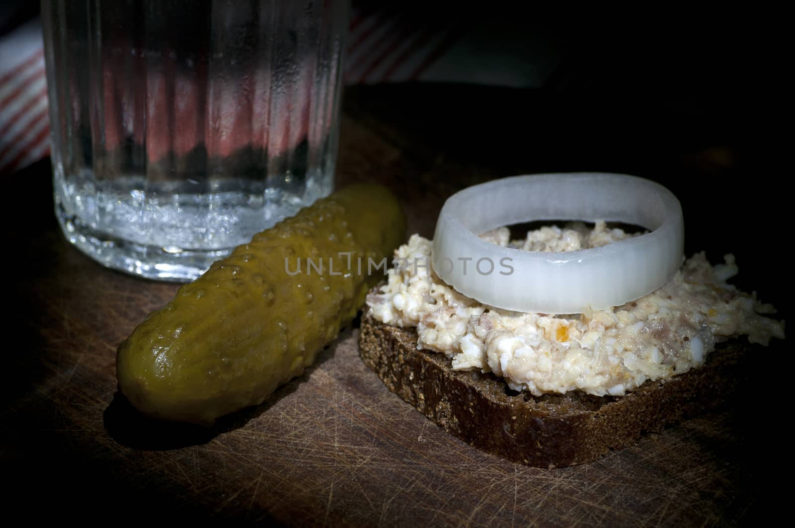 Sandwich with forshmak (minced herring) and glass of vodka by dred