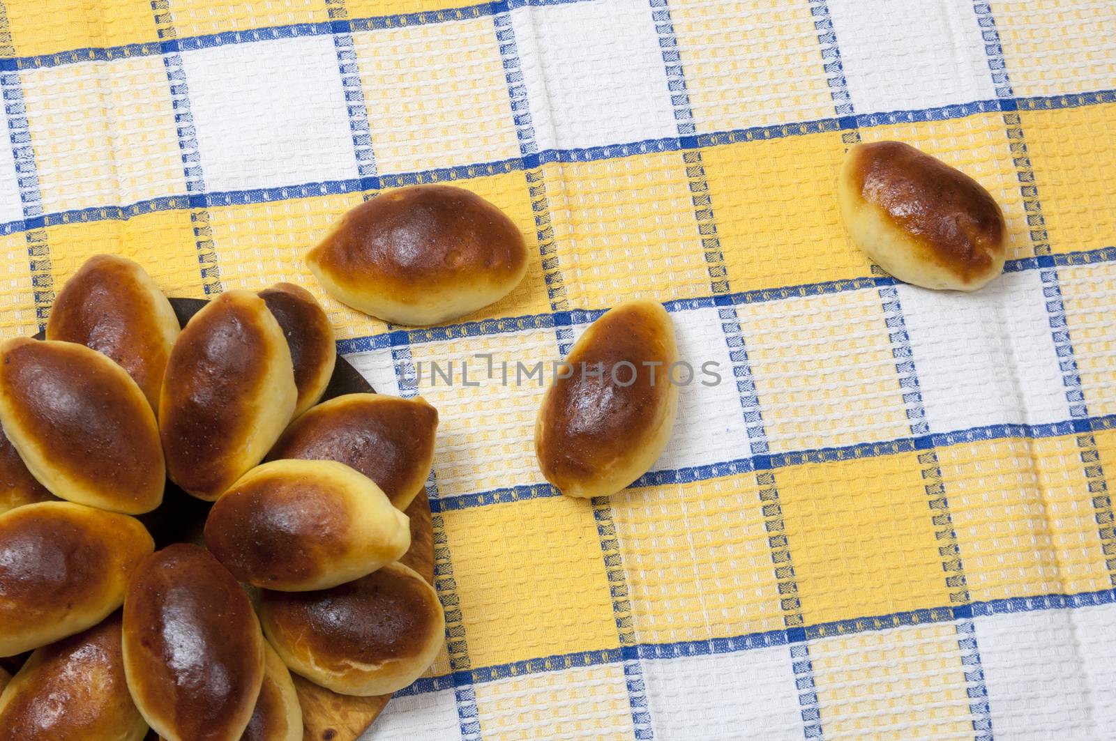 Homemade pastries (patties) on towel