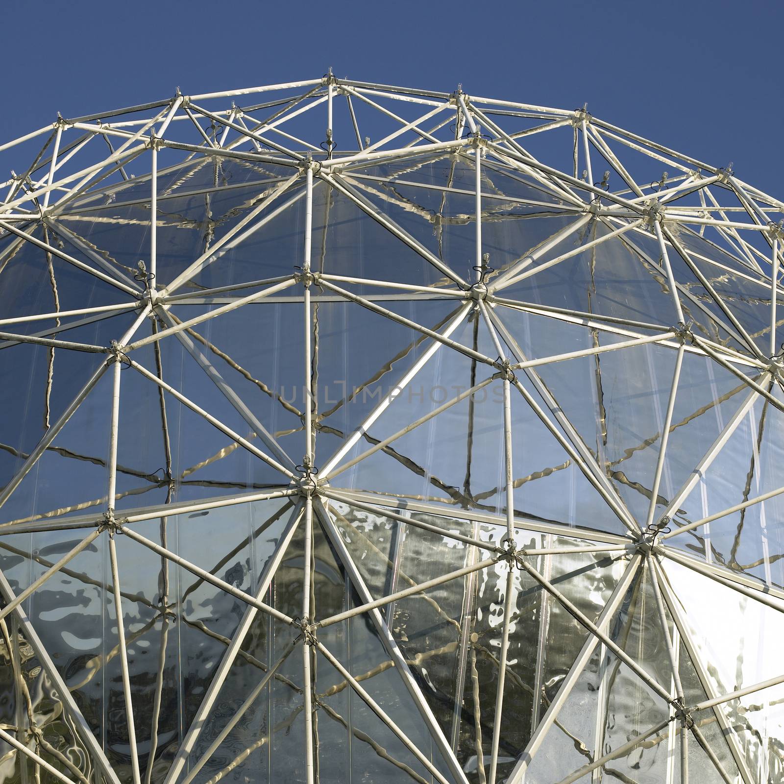 Large silver dome and blue sky
