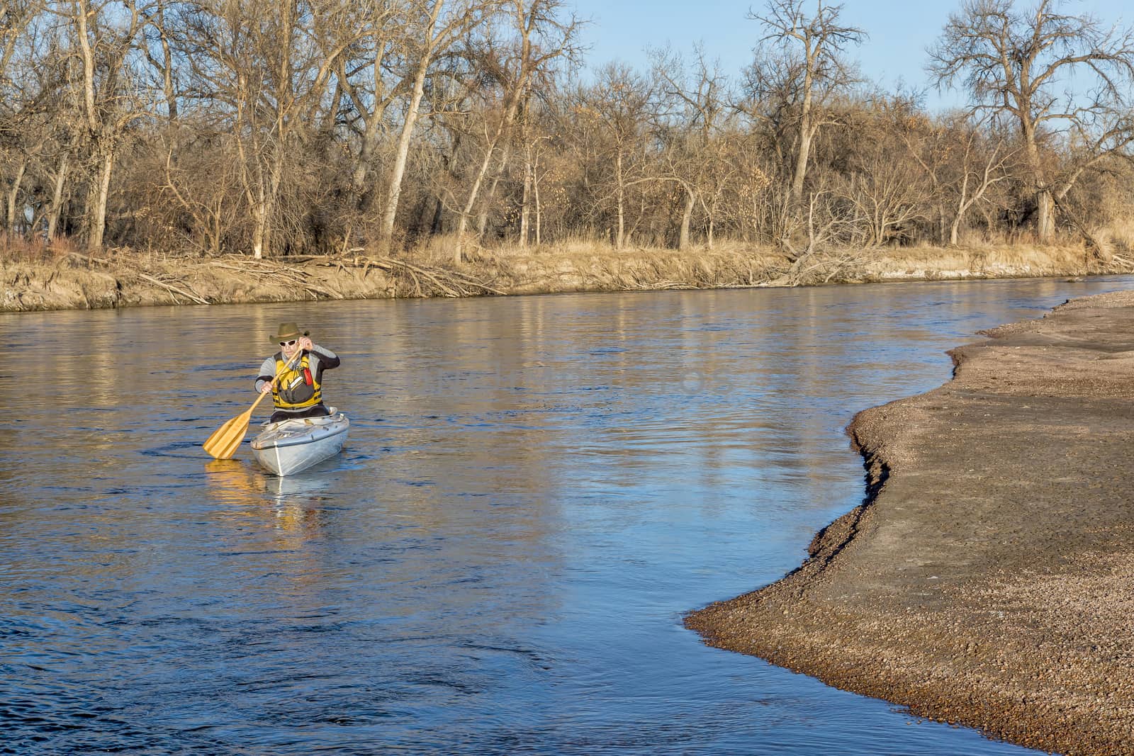 canoe paddling on South Platte RIver by PixelsAway