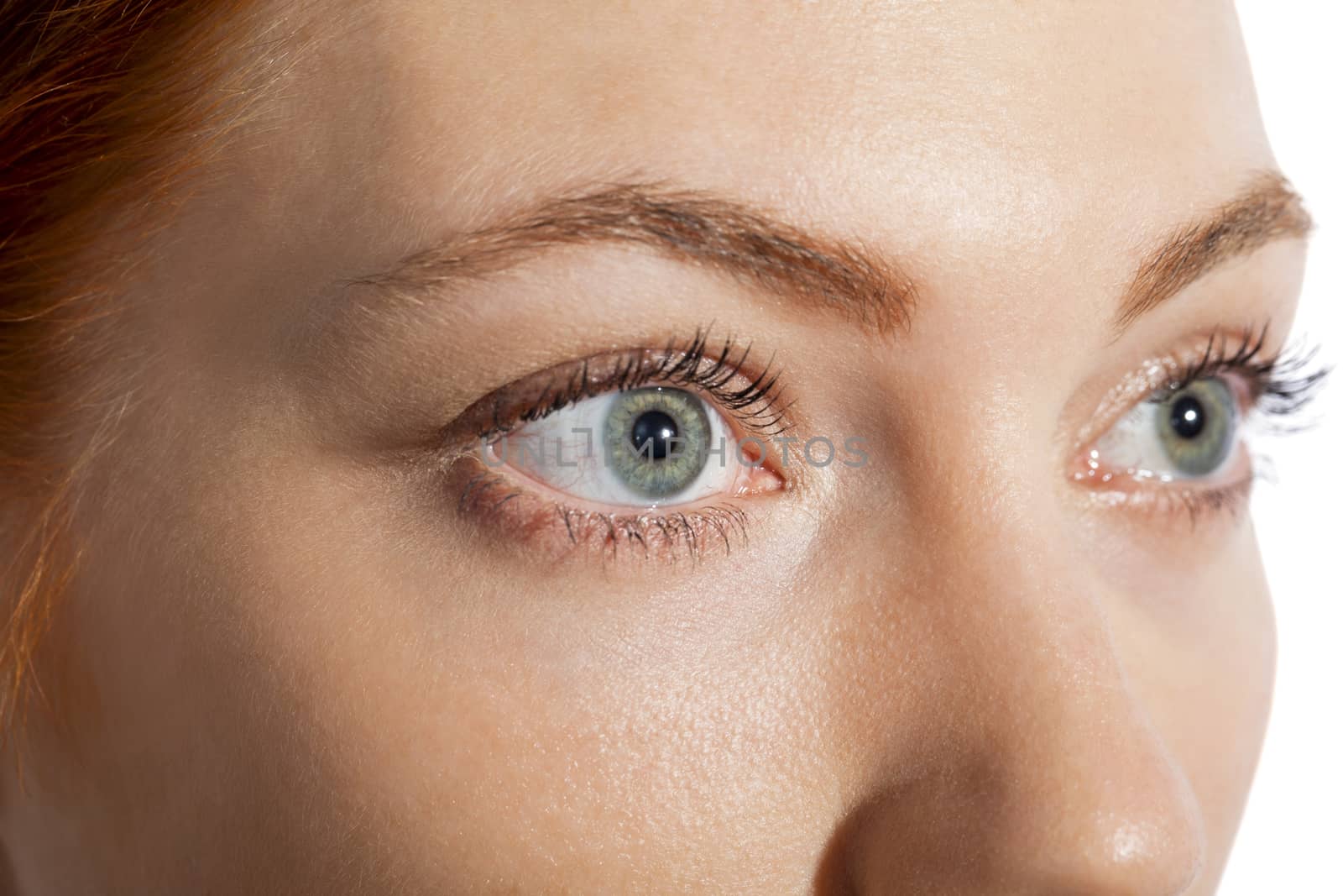 Conceptual Close up Gray Eye of a Woman Looking Up