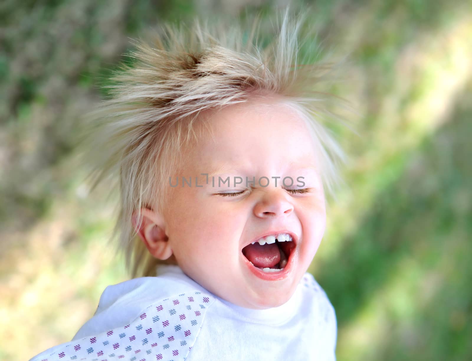 Happy Child in the Summer Park