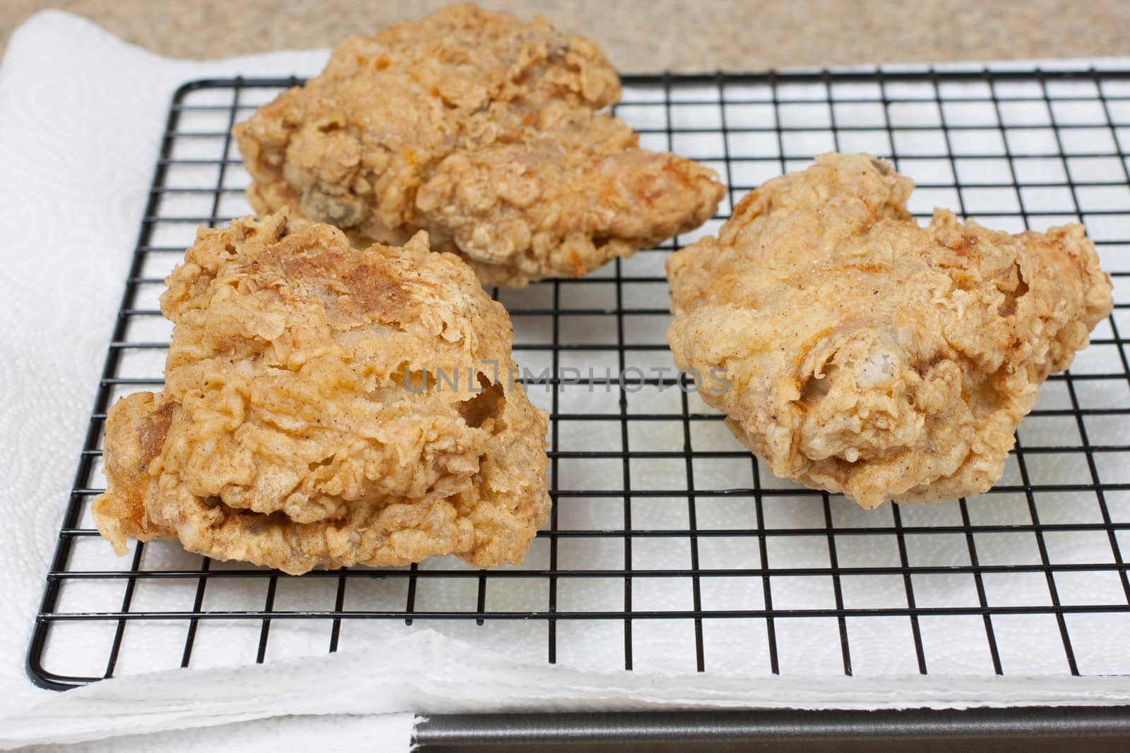 Fried Chicken on a cooling rack by SouthernLightStudios