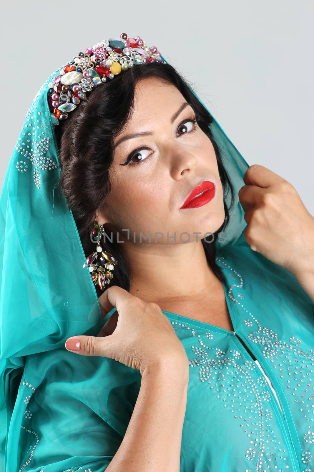 Adult arabian woman in green abaya