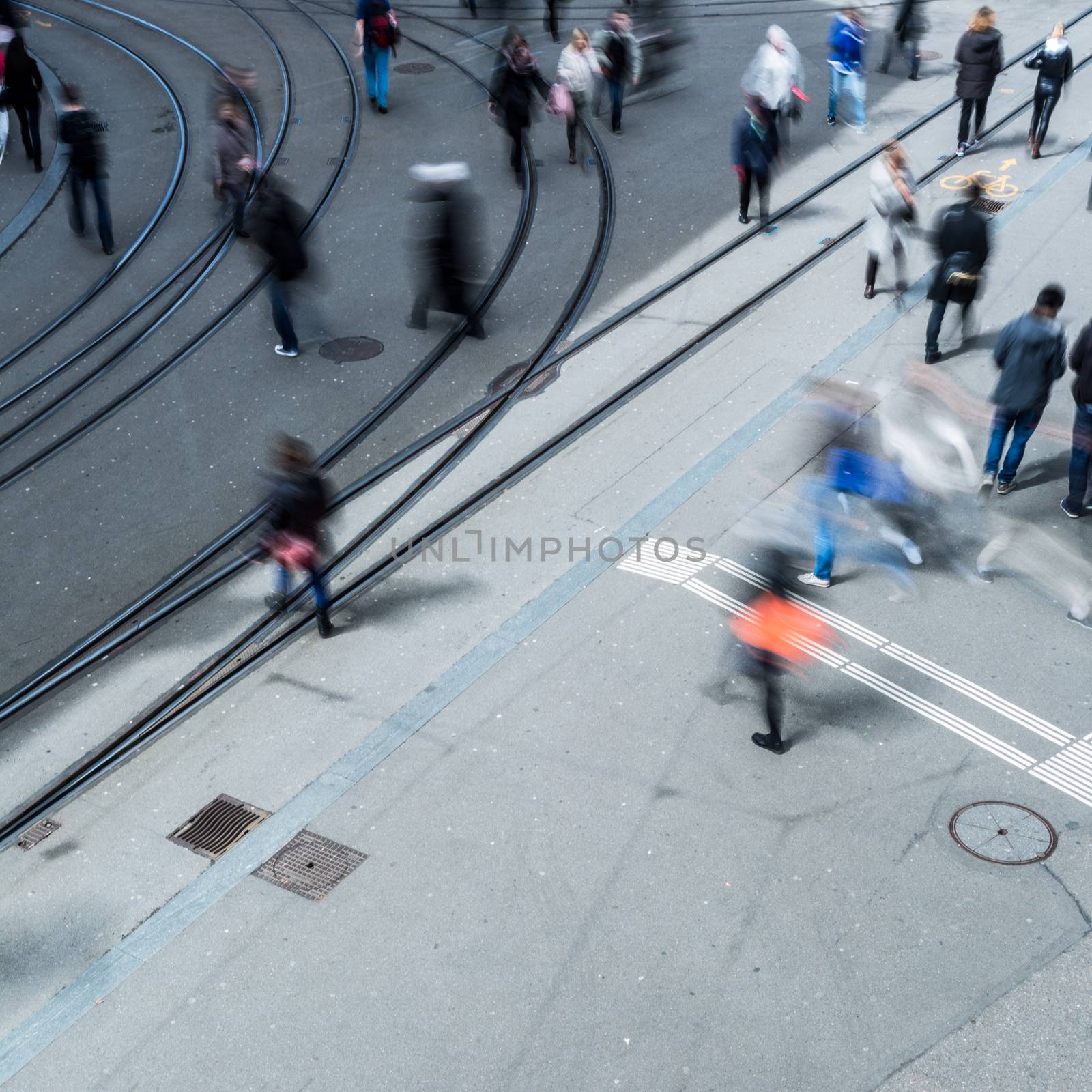 urban traffic concept - city street with a motion blurred crowd  by viktor_cap