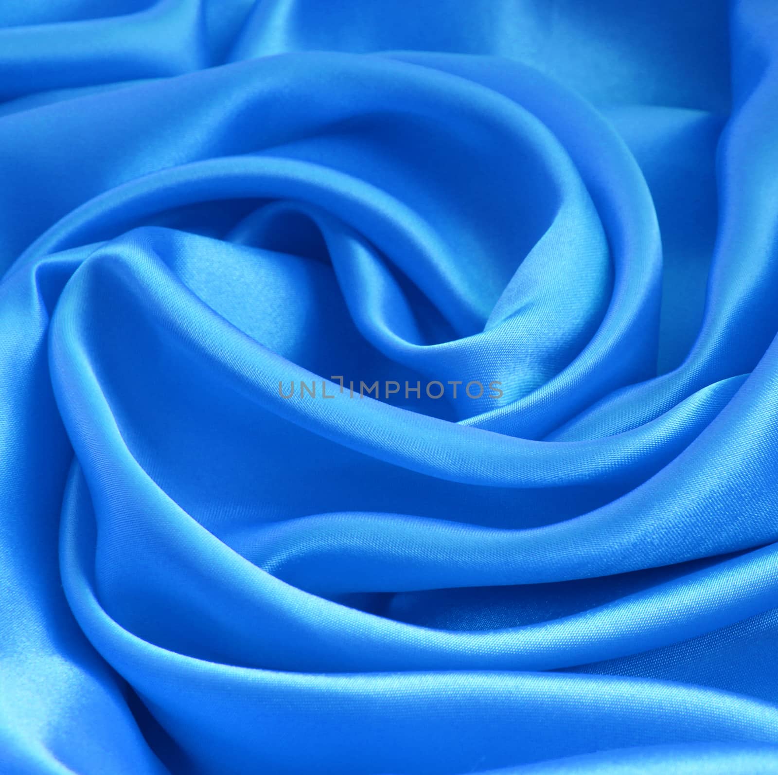 Smooth elegant blue silk or satin can use as background 