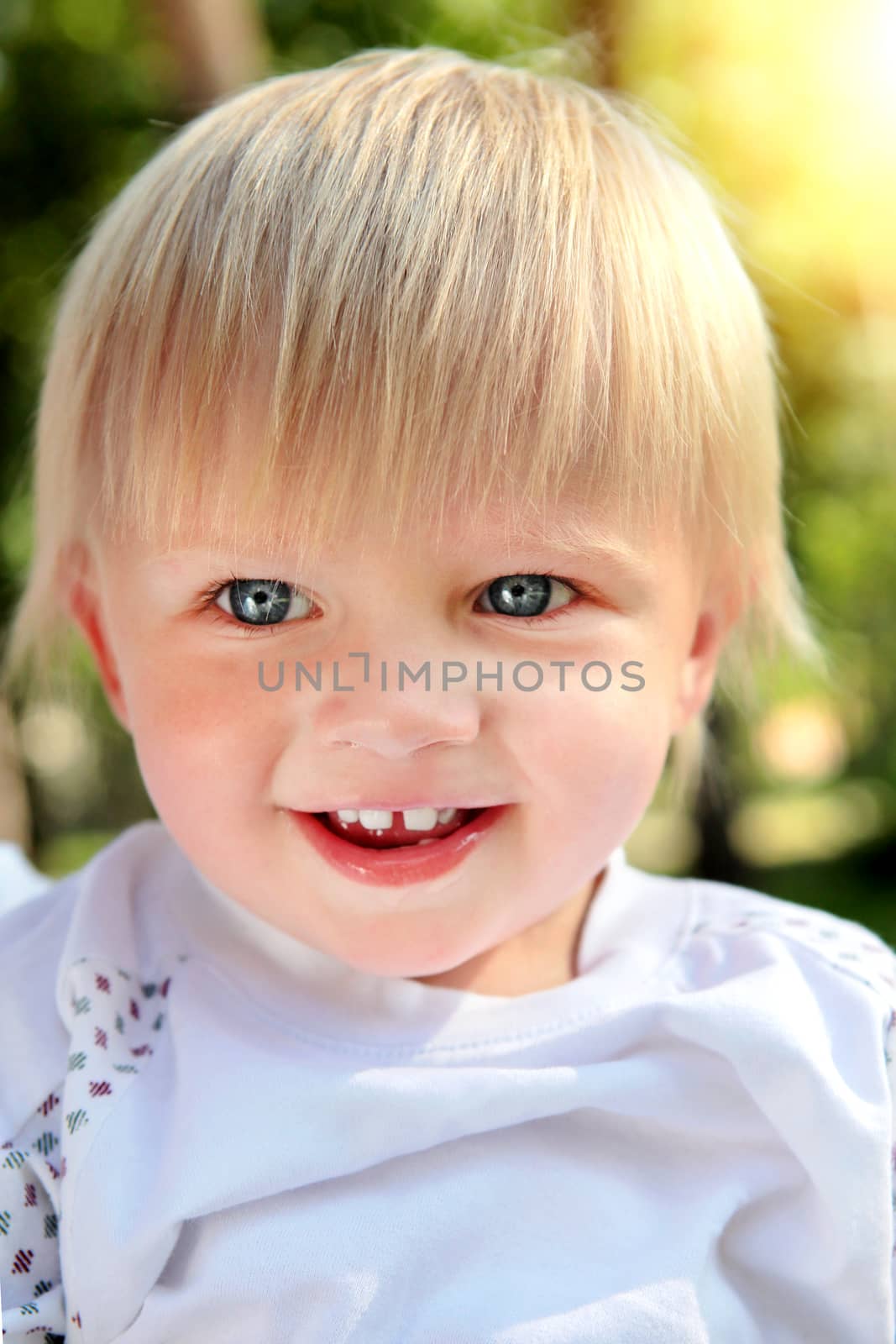 Cheerful Child Portrait at the Summer Park