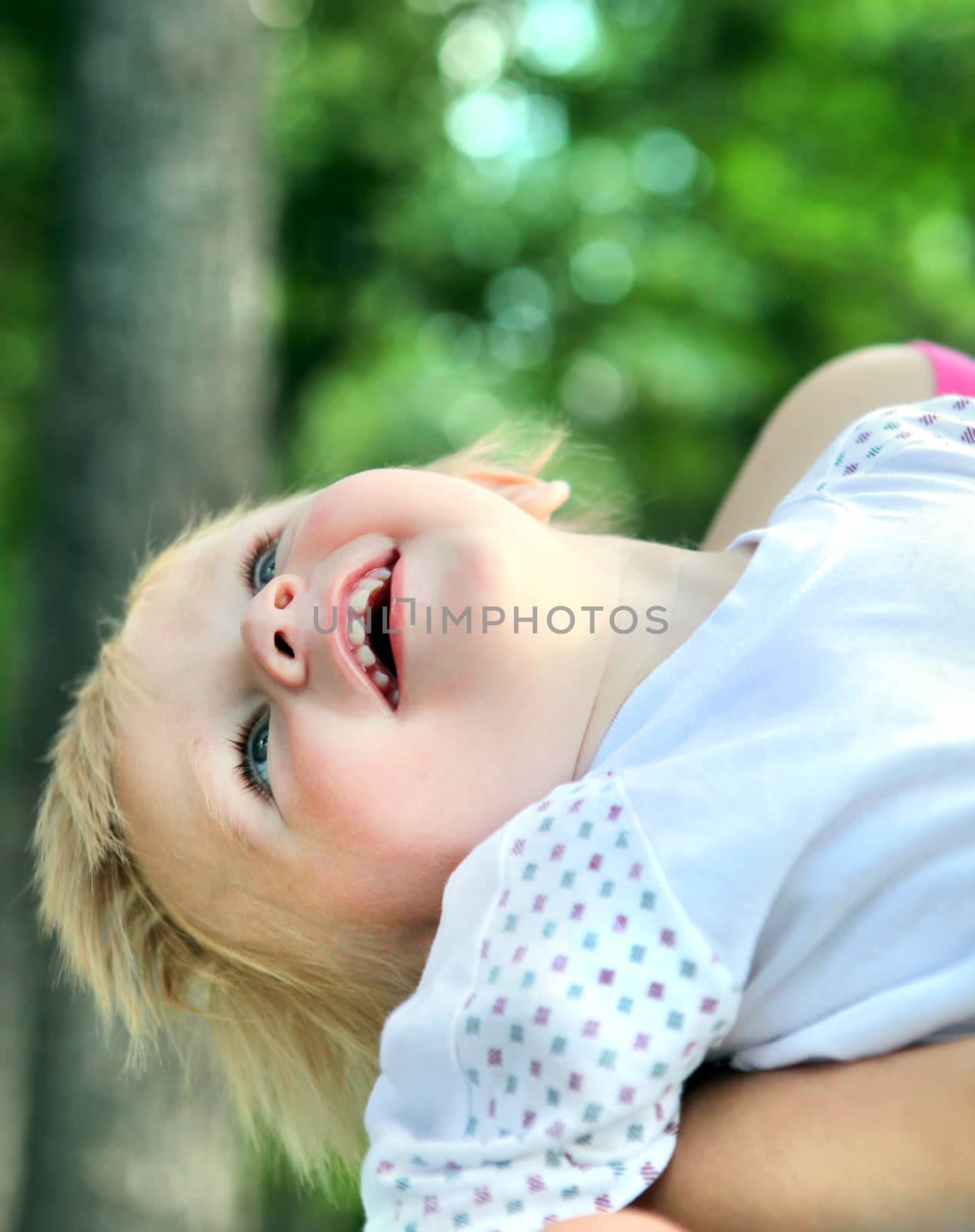 Happy Child in the Summer Park