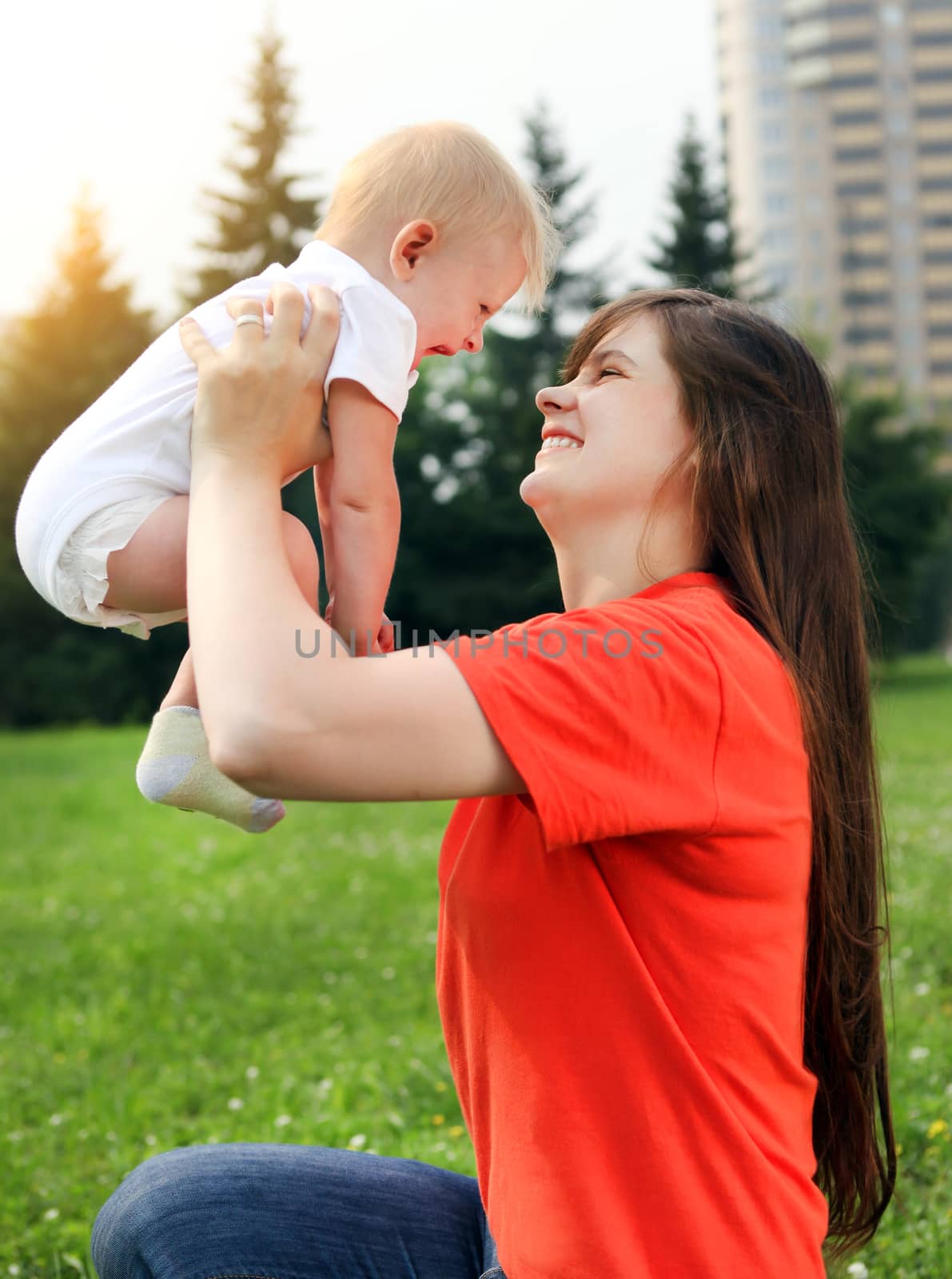 Happy Mother and Little Baby outdoor