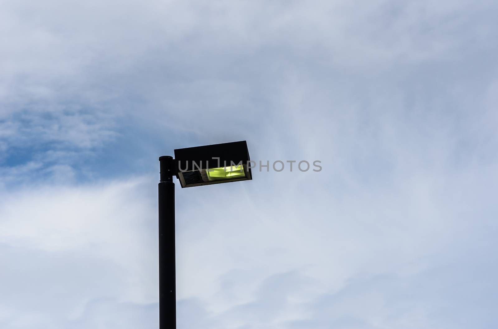 Black Light pole in the blue sky