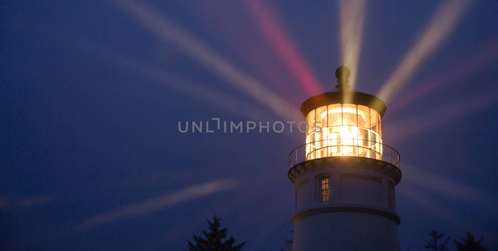 Lighthouse Beams Illumination Into Rain Storm Maritime Nautical  by ChrisBoswell
