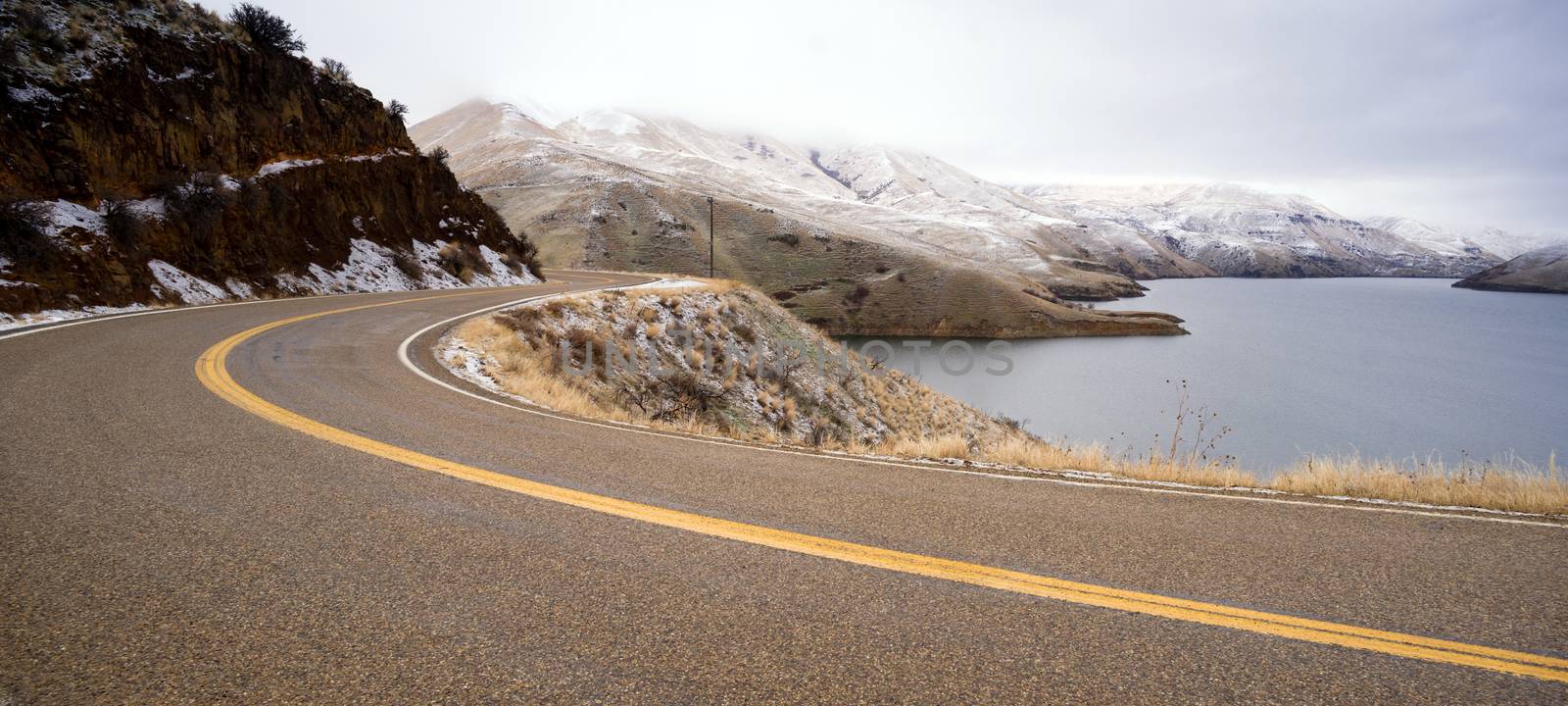 The road winds around a reservoir near the Old Brownlee Ferry site