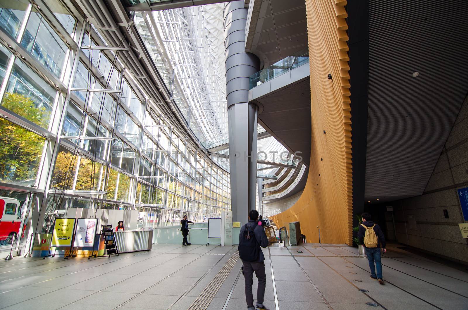 Tokyo, Japan - November 26, 2013: People visit Tokyo International Forum on November 26 2013 in Tokyo Japan. the Forum is one of Tokyo's architectural marvels. Architect Rafael Vinoly won Japan's first international architecture competition with his design.