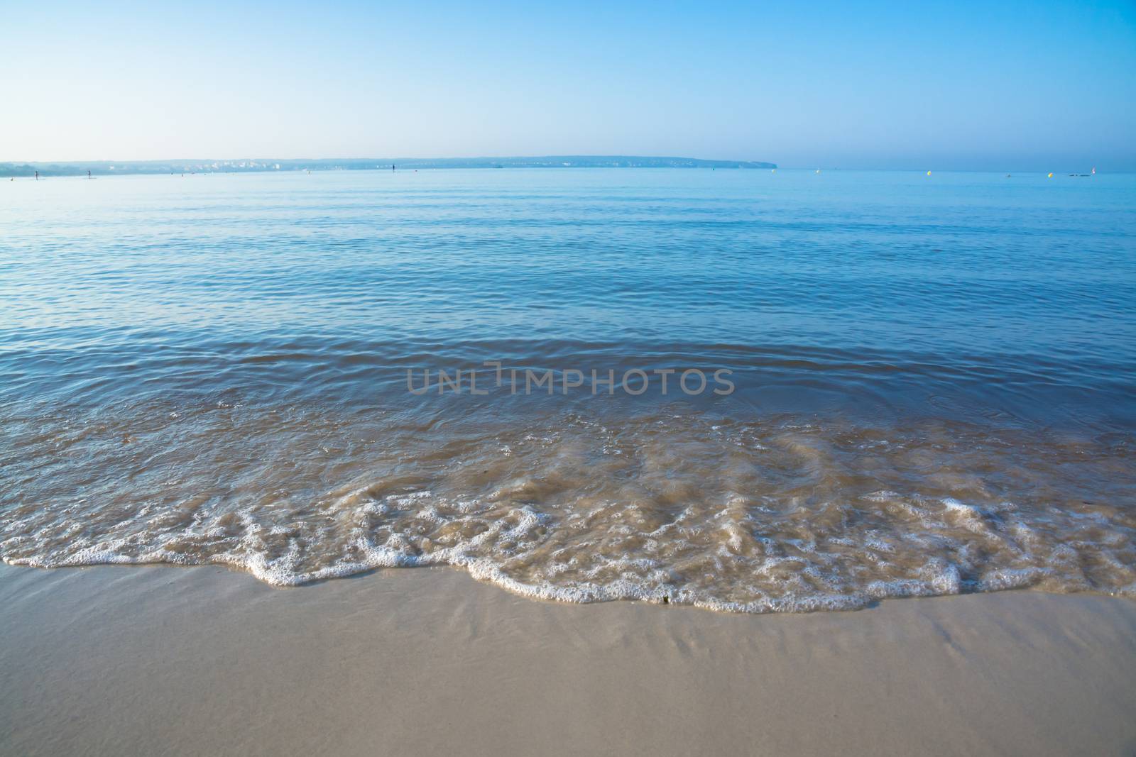 Morning waves closeup. Mallorca, Balearic islands, Spain in July.