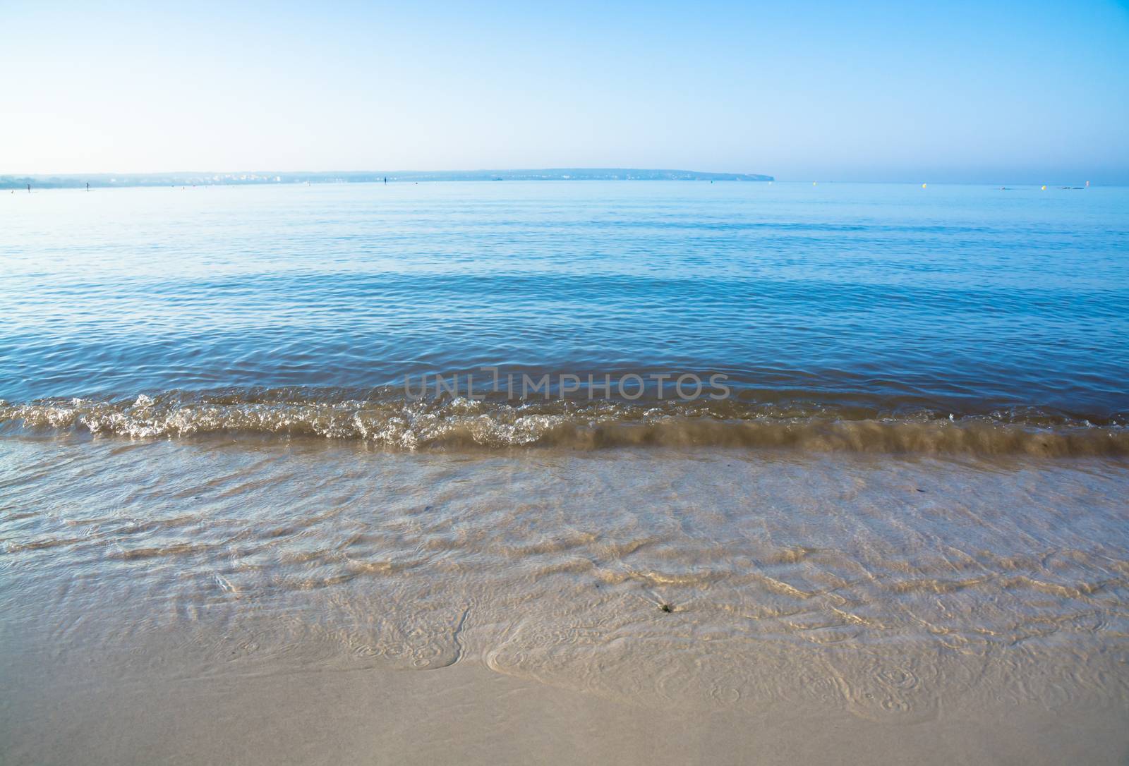 Morning waves closeup. Mallorca, Balearic islands, Spain in July.