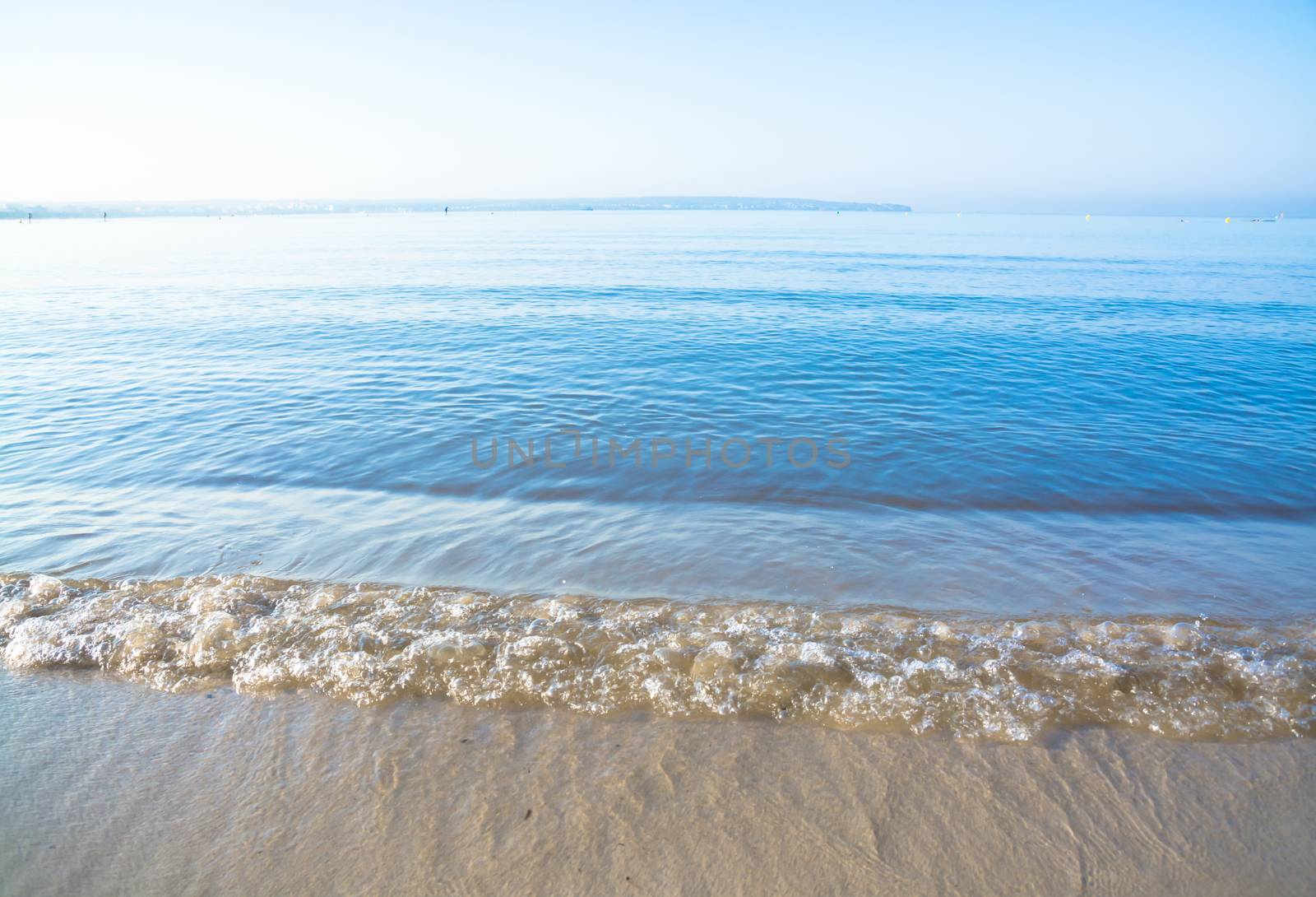 Morning waves closeup. Mallorca, Balearic islands, Spain in July.