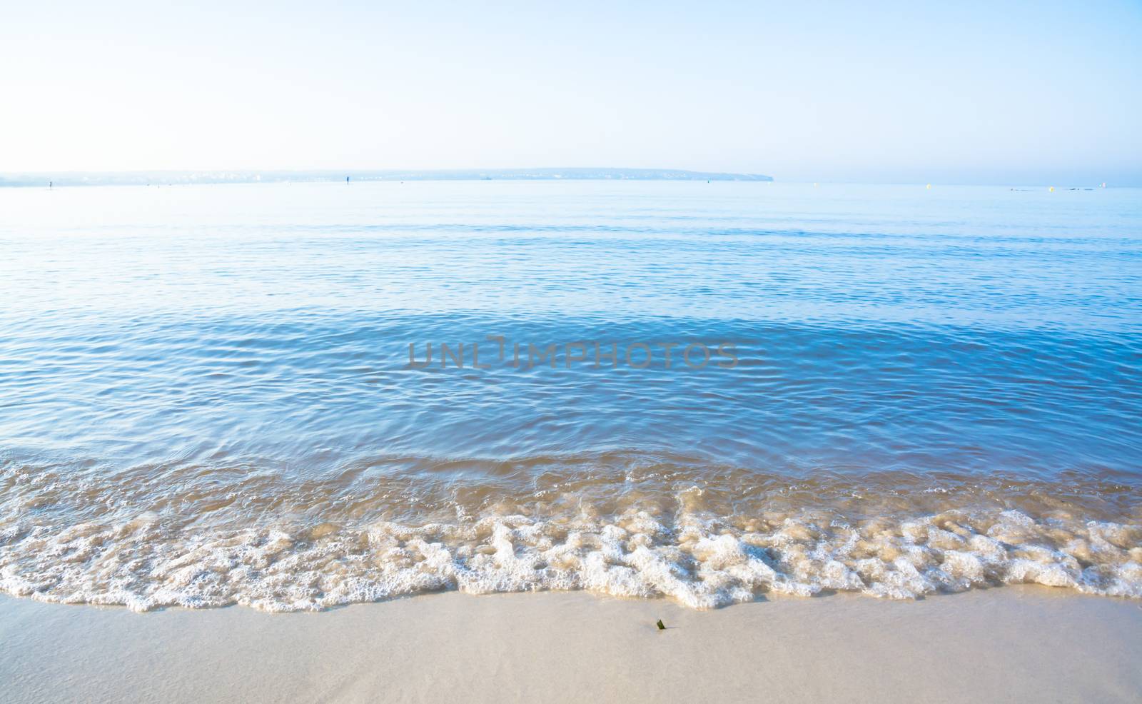 Morning waves closeup. Mallorca, Balearic islands, Spain in July.