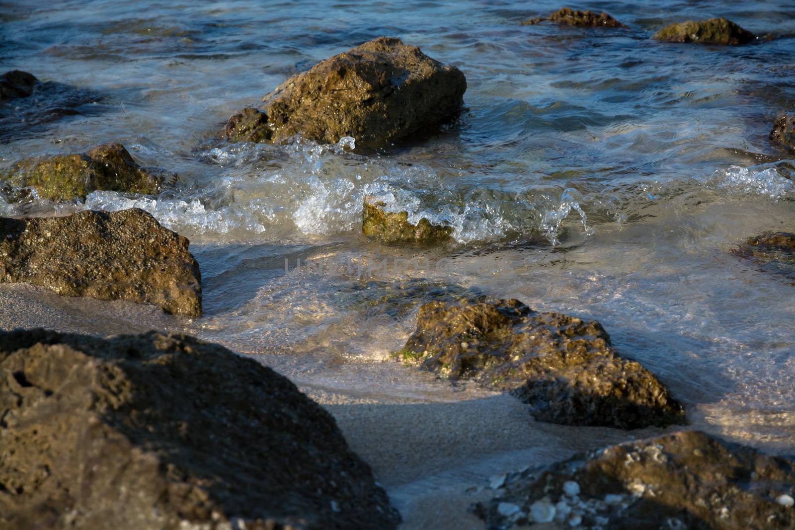 Beach rocks closeup. Mallorca, Balearic islands, Spain in July.