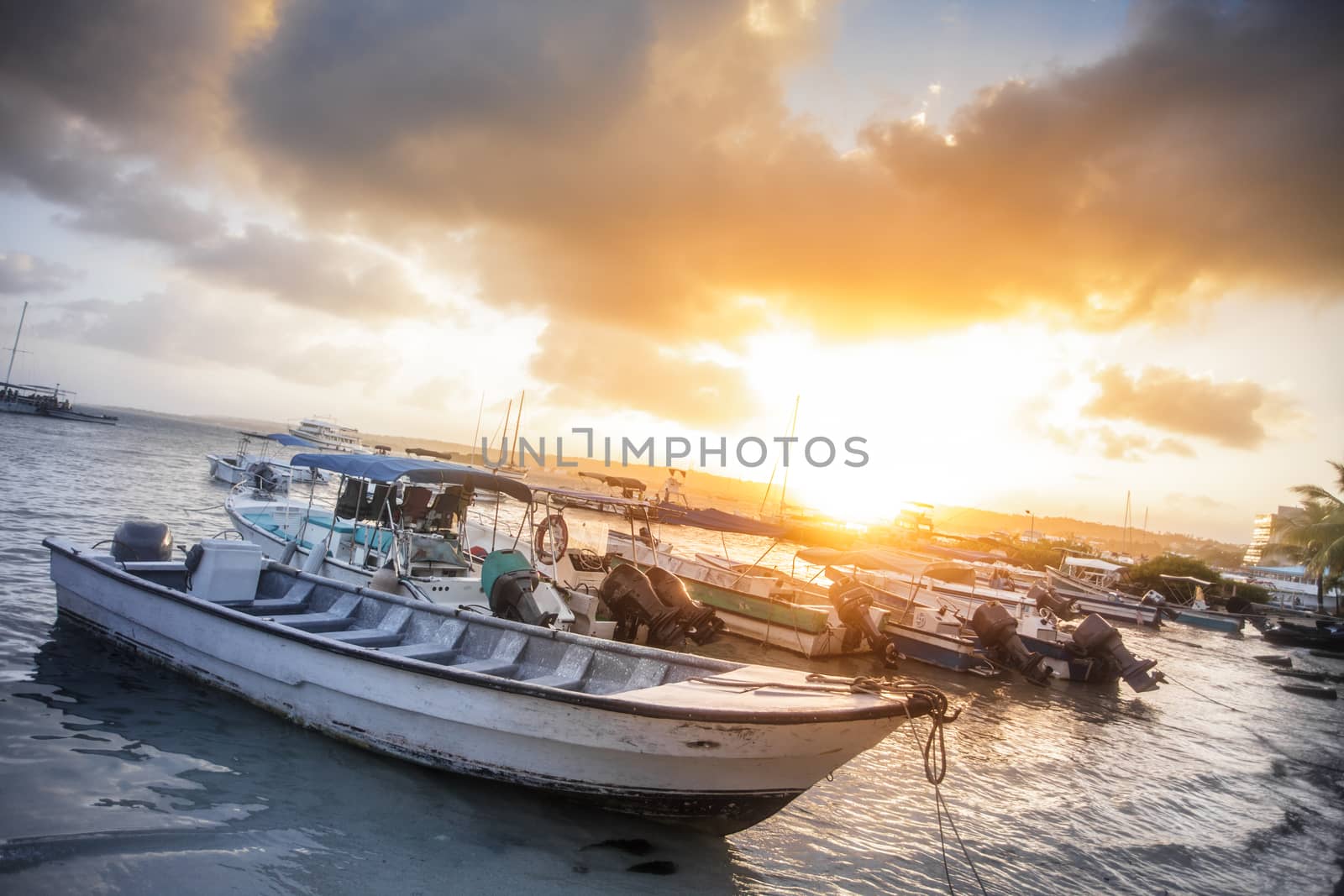 Amazing Scene (sorry I love this photo) of Many Boats on the Beach during the Sunset. - All logo Removed