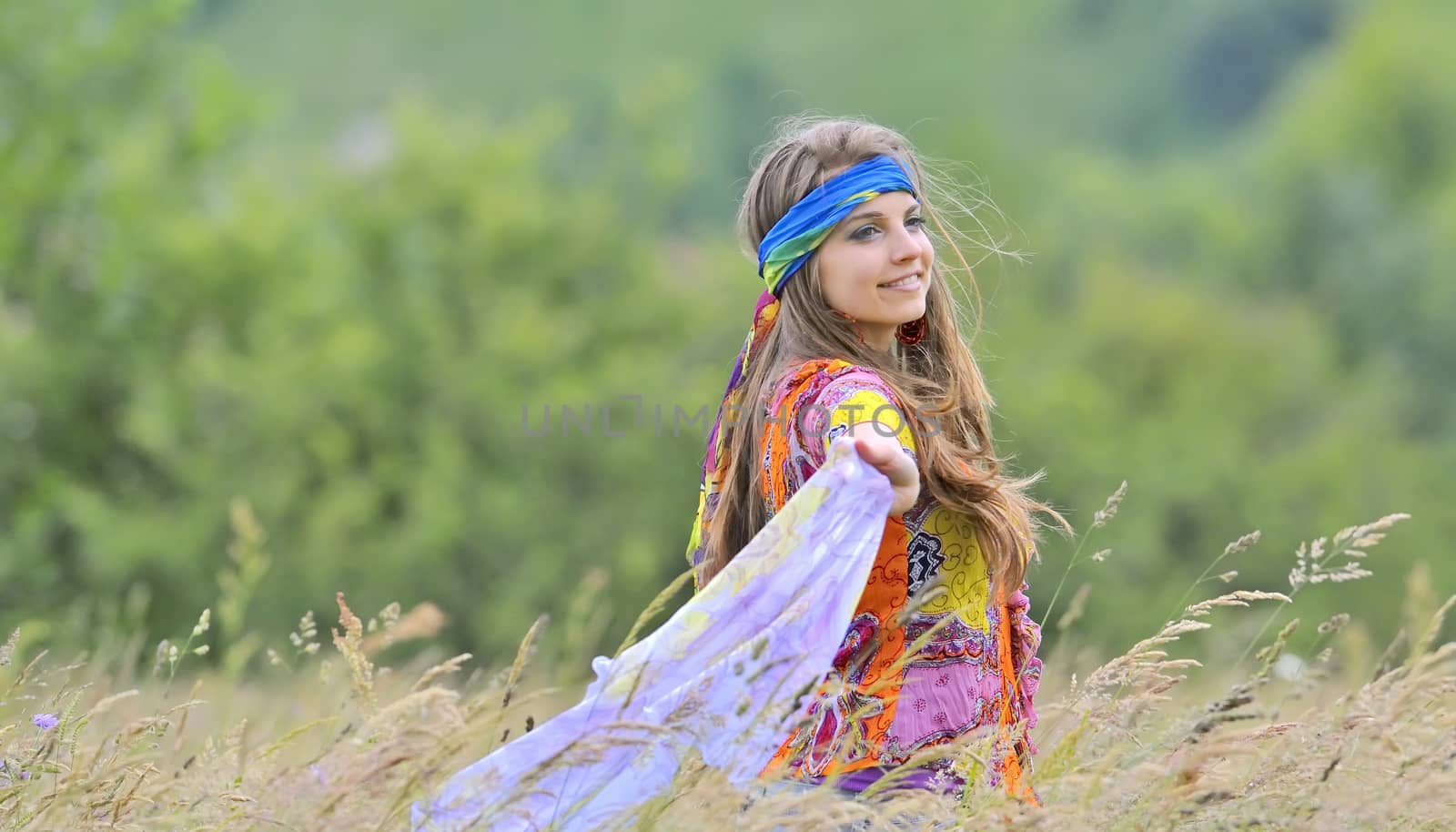 young beautiful girl in the field