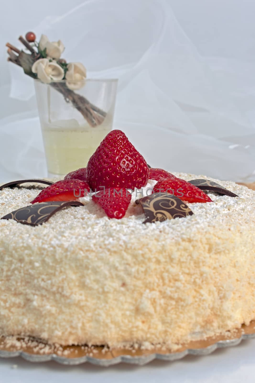 inviting cake with sponge cake and red strawberries