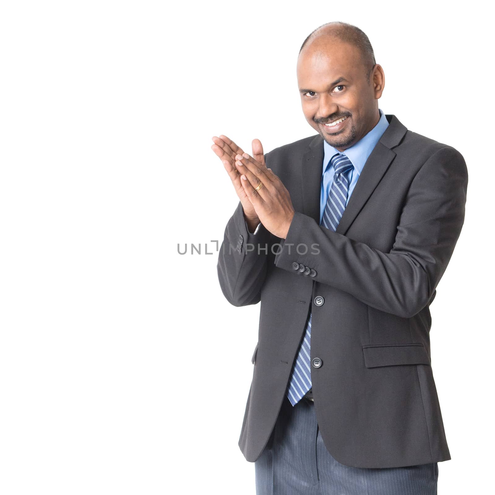 Indian businessman applauding, isolated on white background