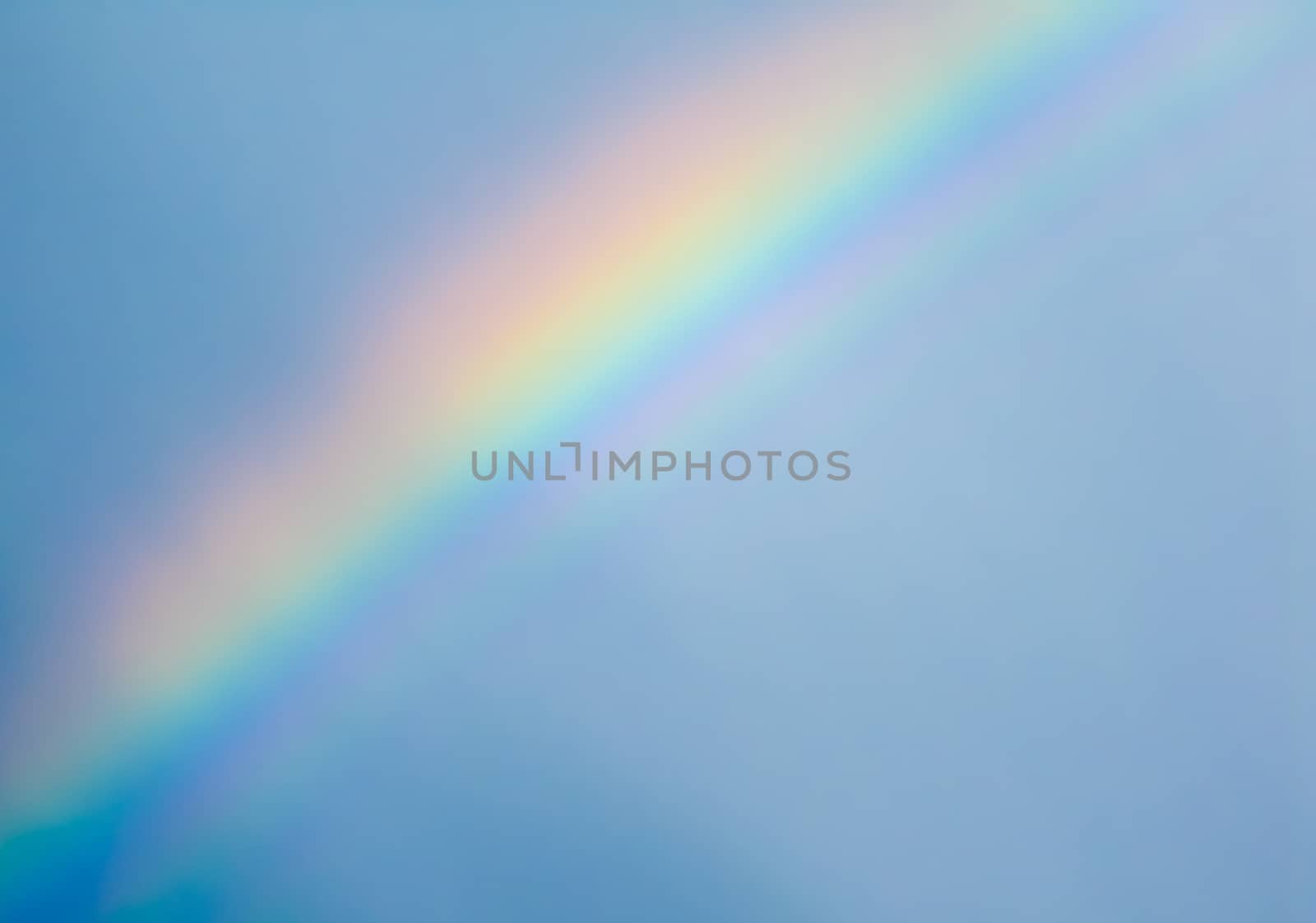 Rainbow on blue sky after rain. Stockholm, Sweden.