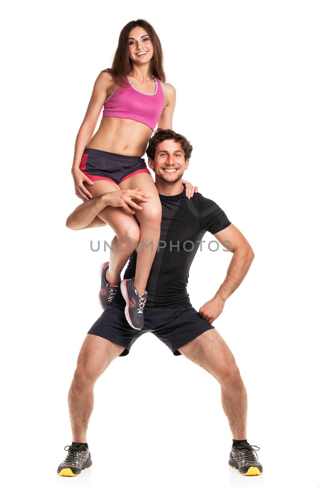 Sports guy holds on shoulder a girl on a white by vlad_star