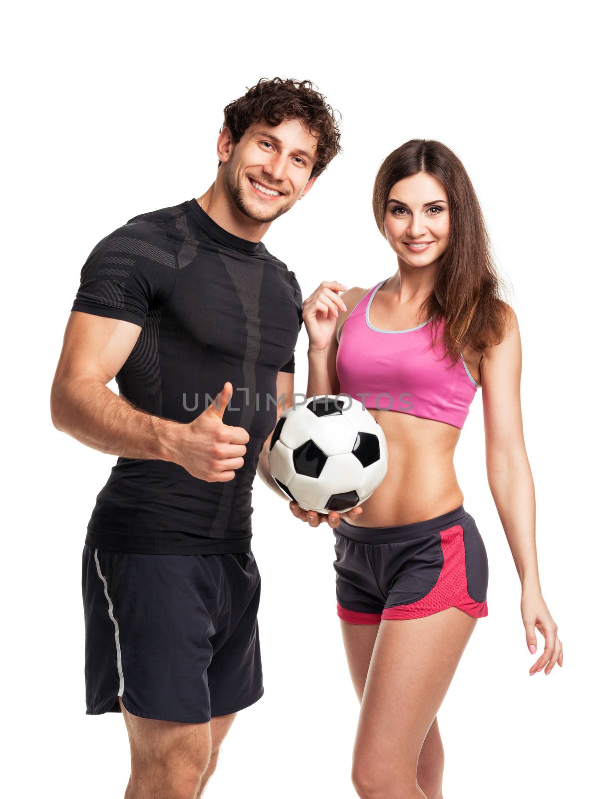 Athletic man and woman with ball on the white background