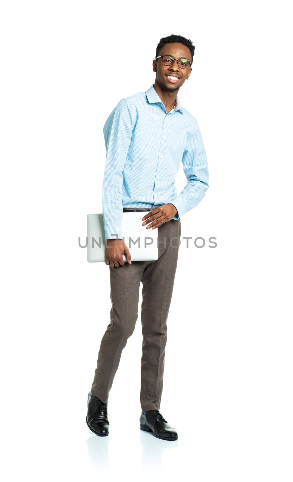 Happy african american college student with laptop standing on white background