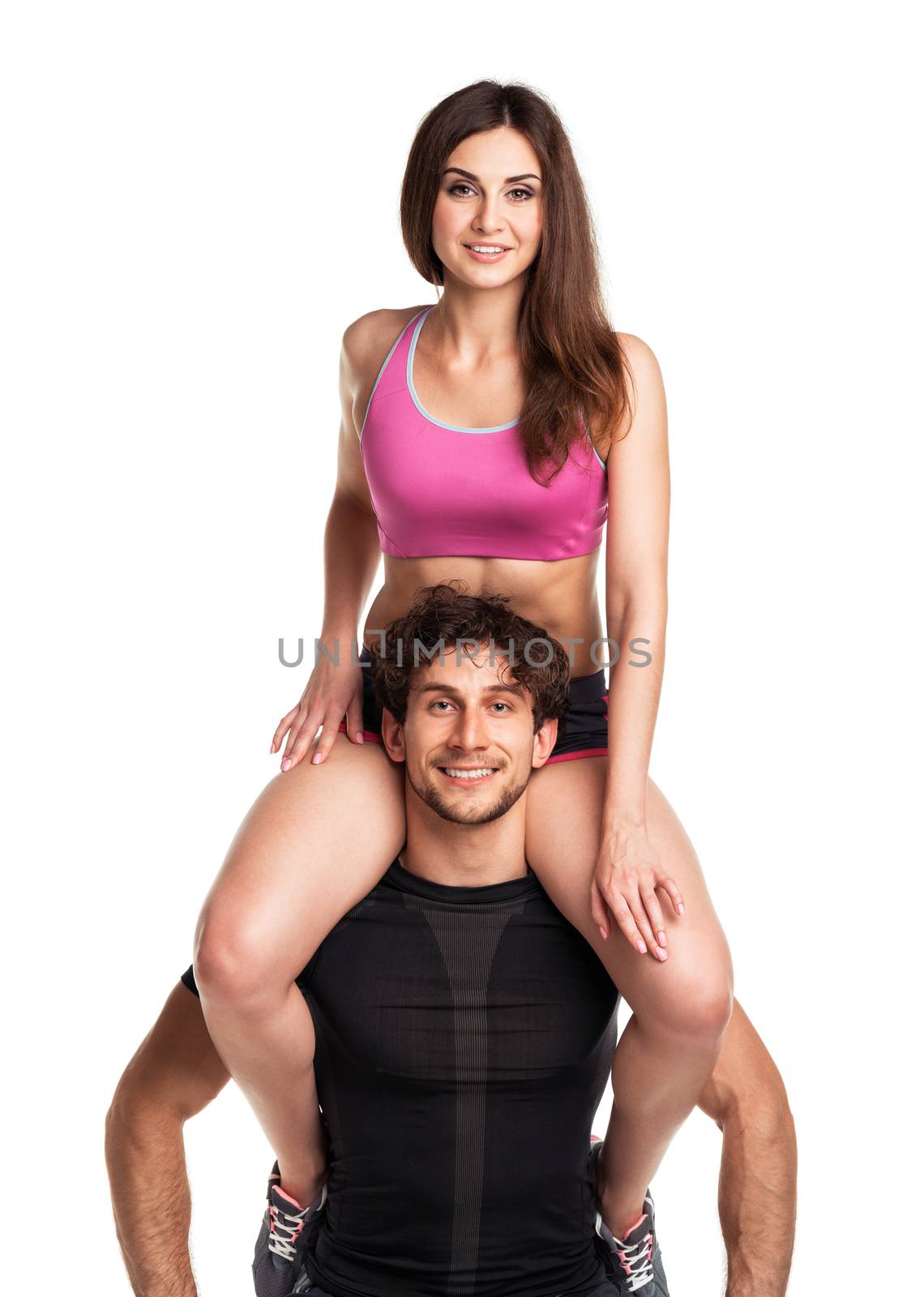 Sports guy holds on shoulder a girl on a white by vlad_star