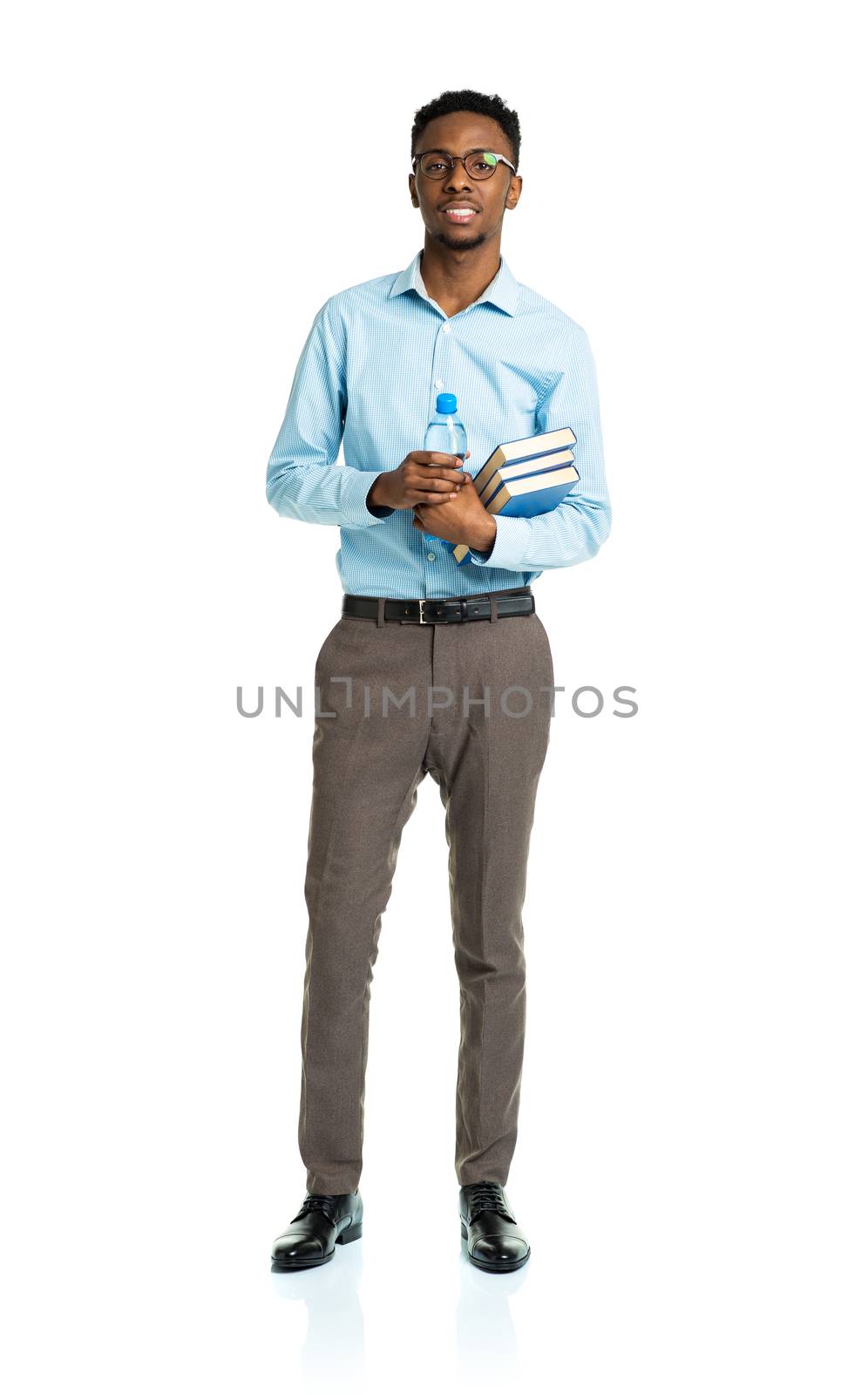 Happy african american college student with books in his hands standing on white background