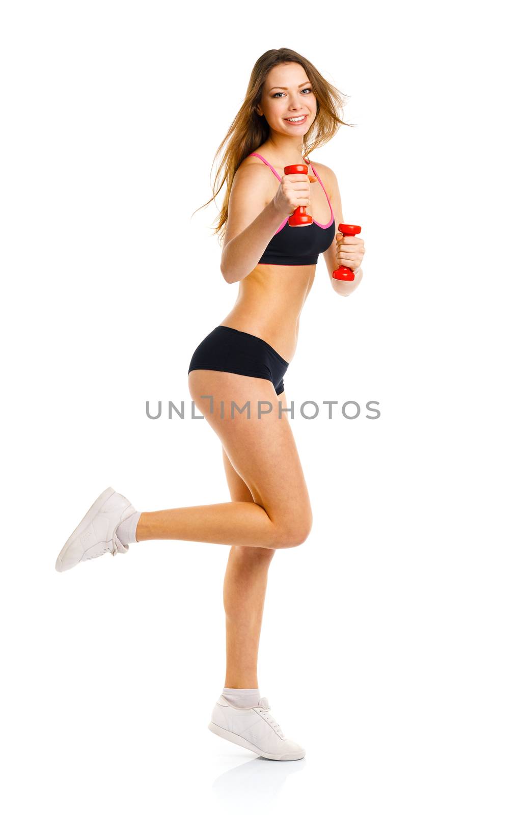 Beautiful sport woman with dumbbells doing sport exercise, isolated on white background