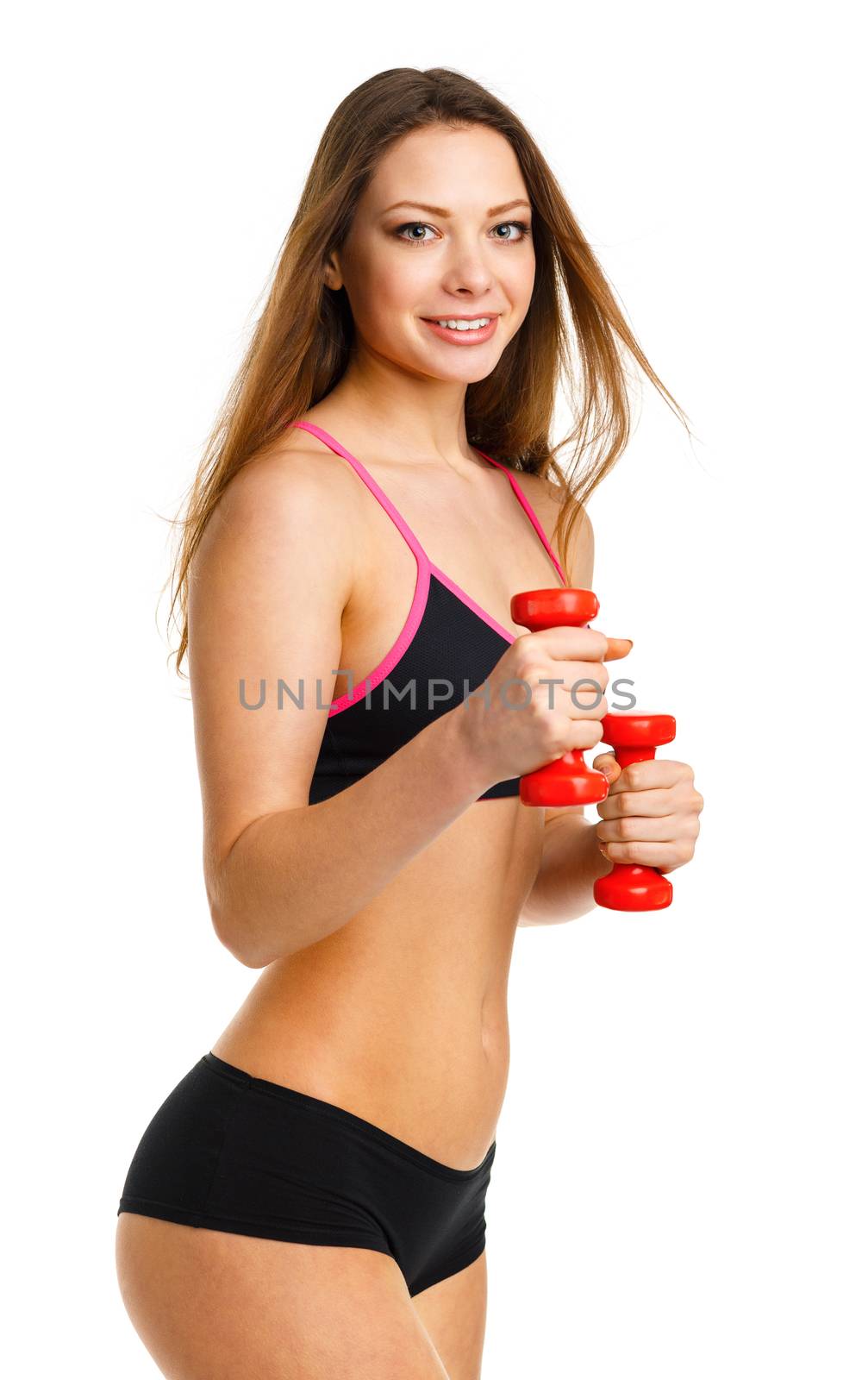 Beautiful athletic woman with dumbbells doing sport exercise, is by vlad_star