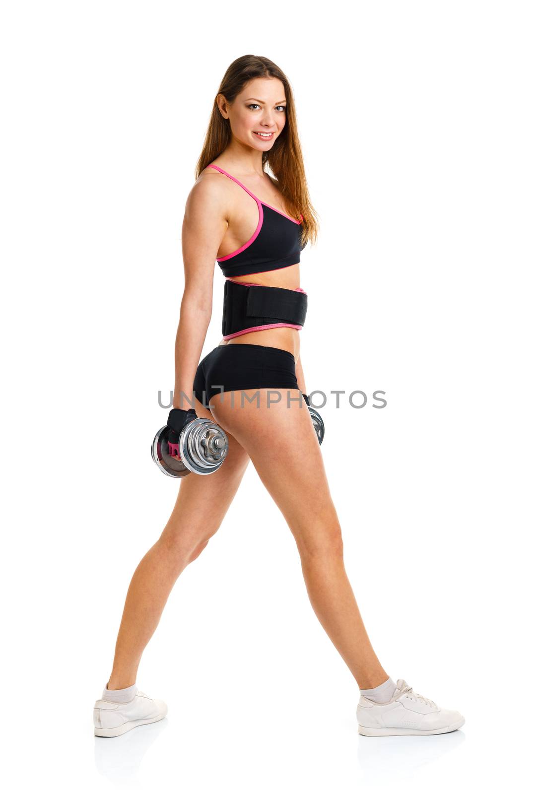 Beautiful athletic woman with dumbbells doing sport exercise, is by vlad_star