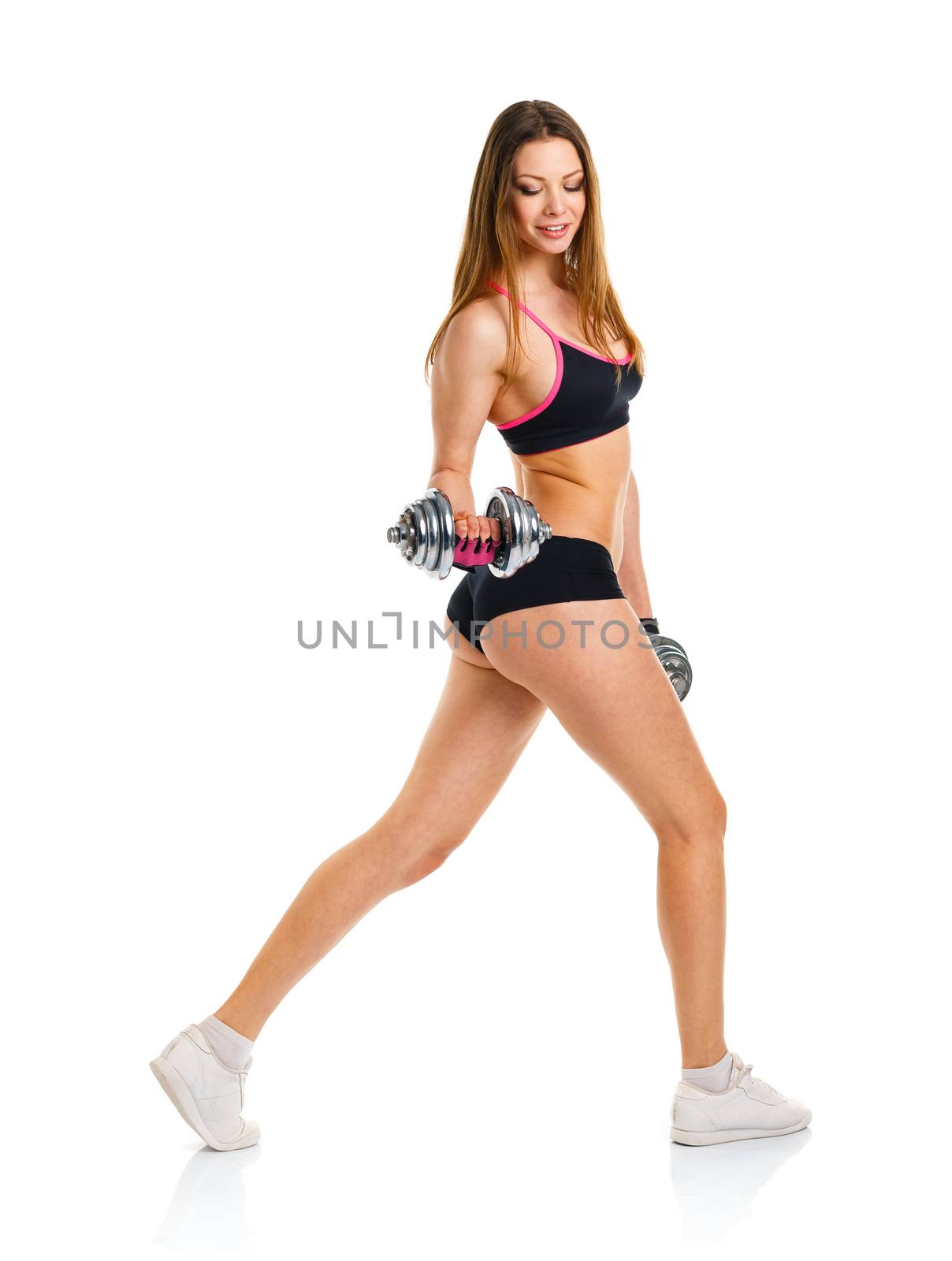 Beautiful sport woman with dumbbells doing sport exercise, isolated on white background