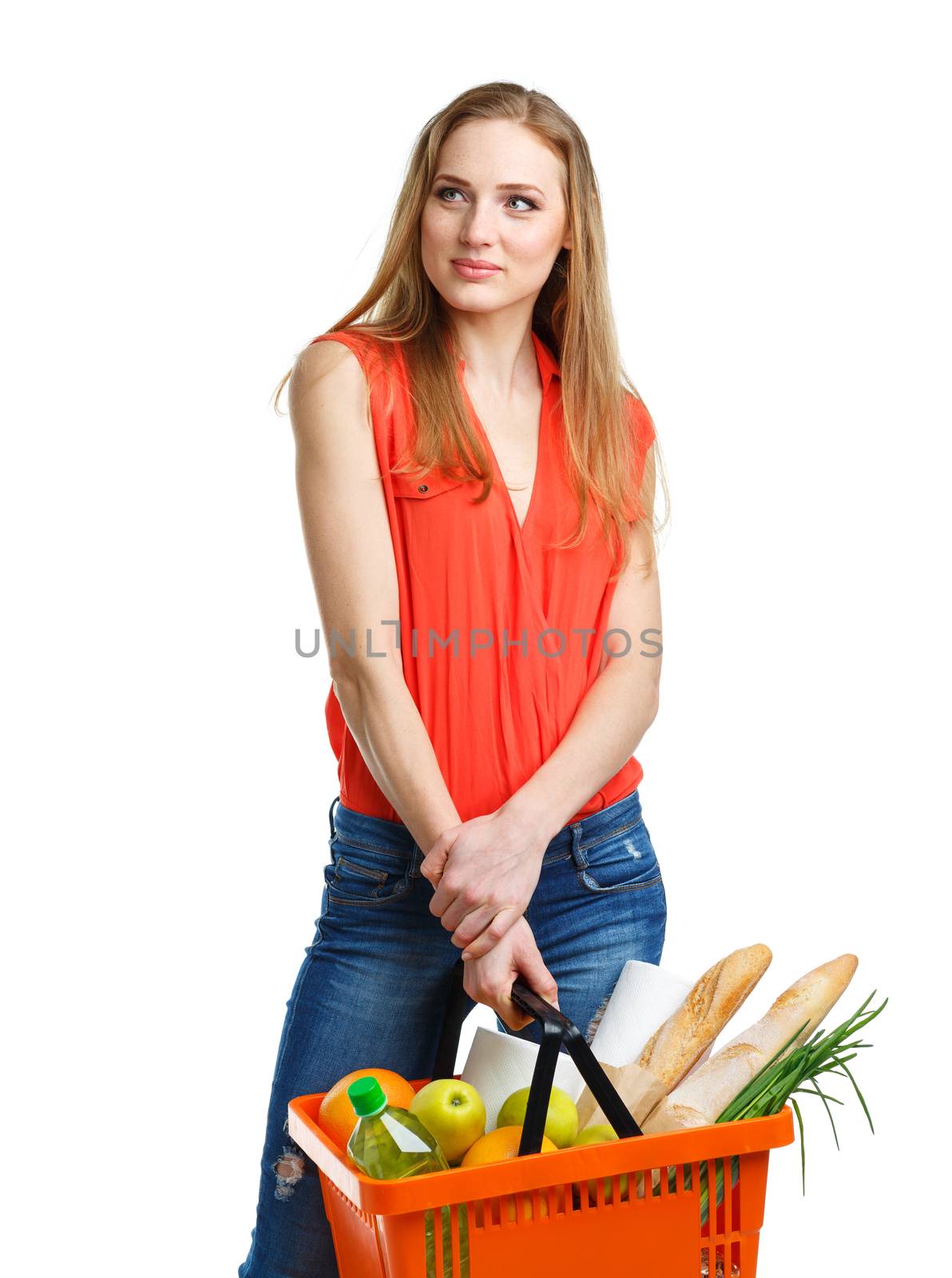 Young caucasian woman with assorted grocery products in shopping by vlad_star
