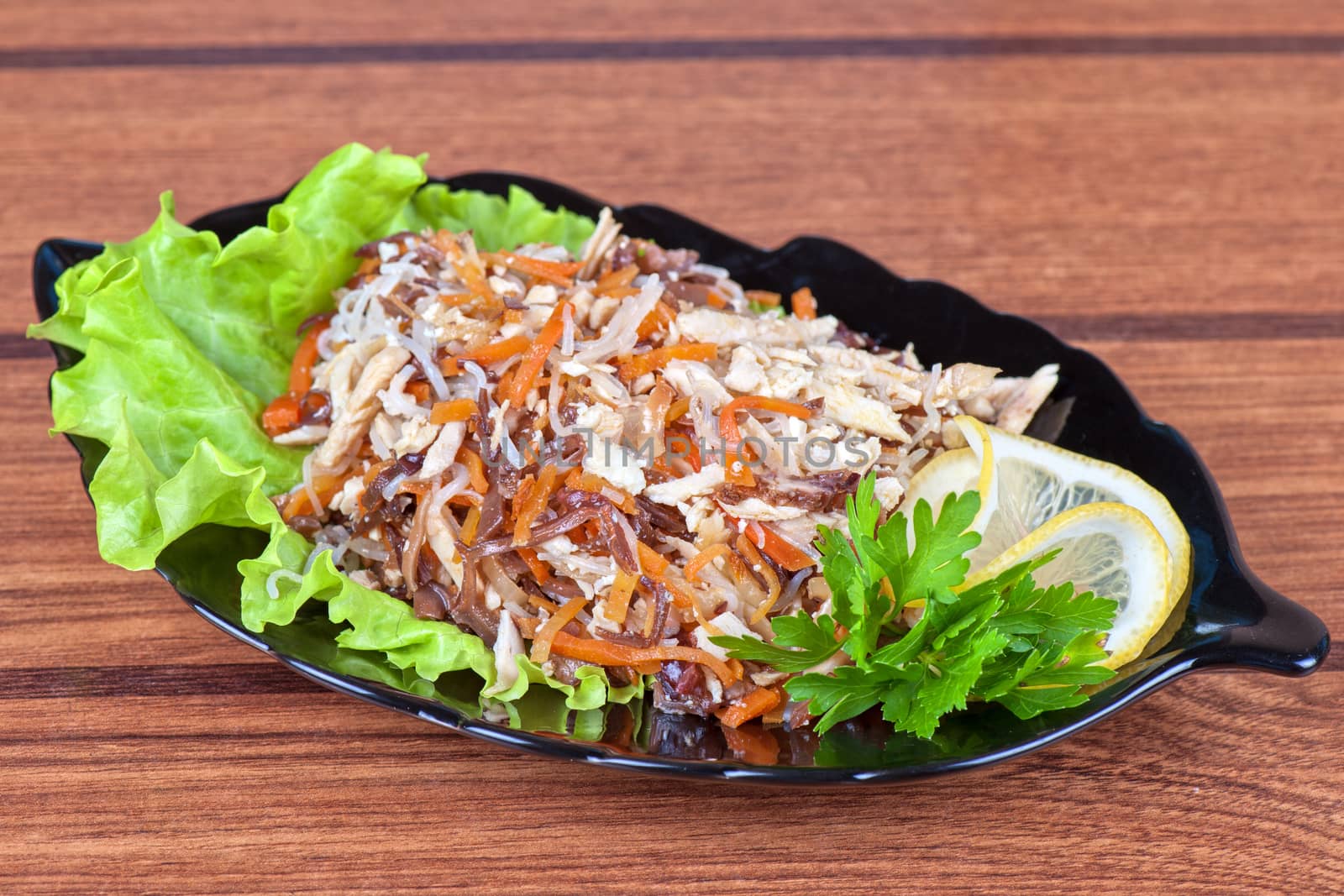 Fresh salad with funchozy, meat and vegetables