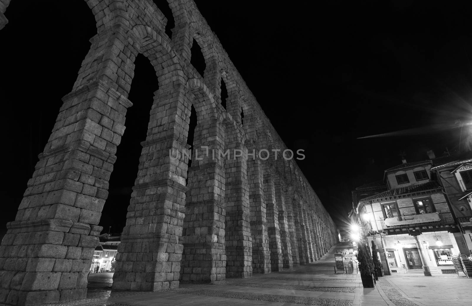 The ancient Roman aqueduct in black and white.