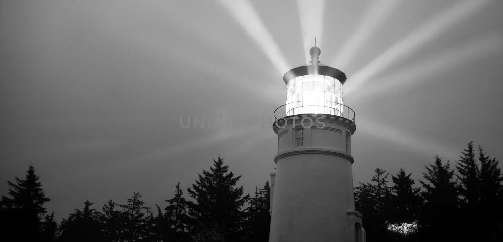 Lighthouse Beams Illumination Into Rain Storm Maritime Nautical  by ChrisBoswell