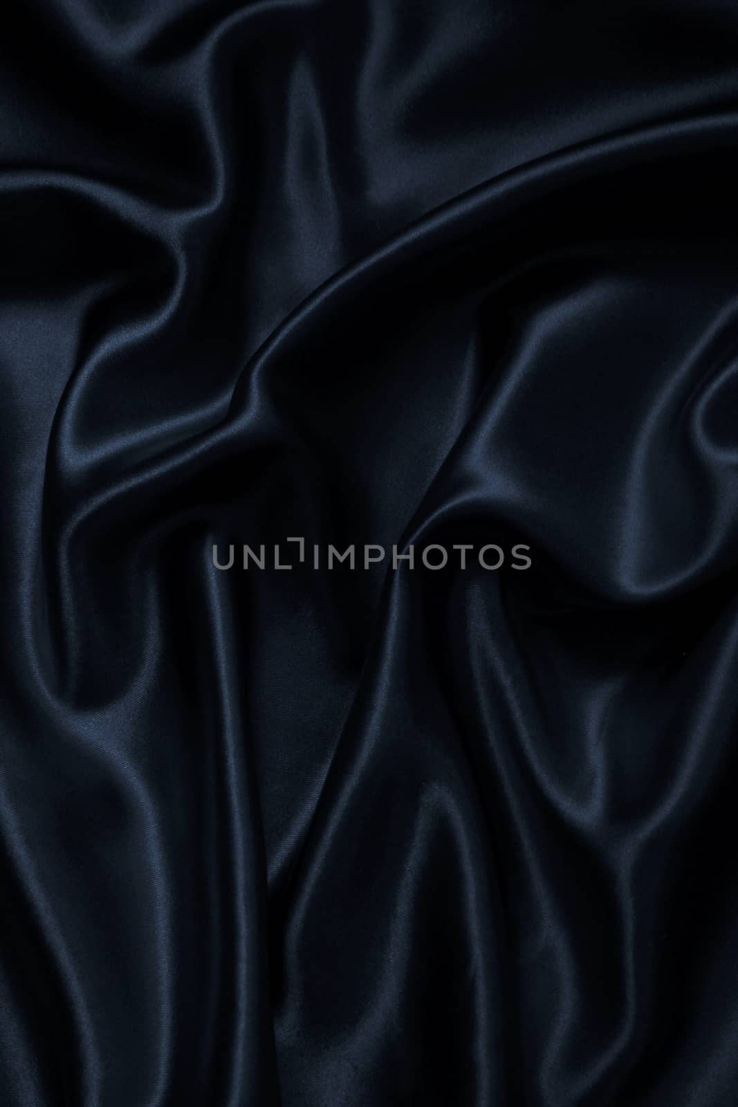 Smooth elegant black silk can use as background 